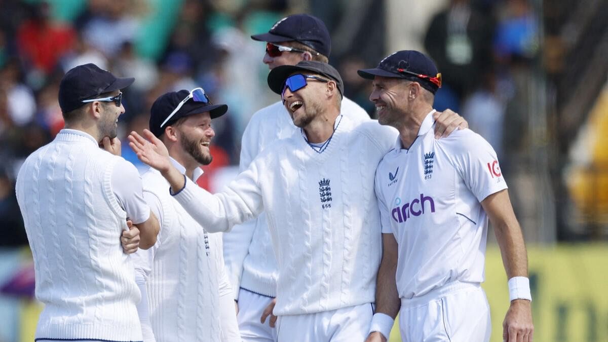 <div class="paragraphs"><p>Joe Root, James Anderson and teammates celebrate after the wicket of India's Rohit Sharma, bowled out by Ben Stokes.</p></div>
