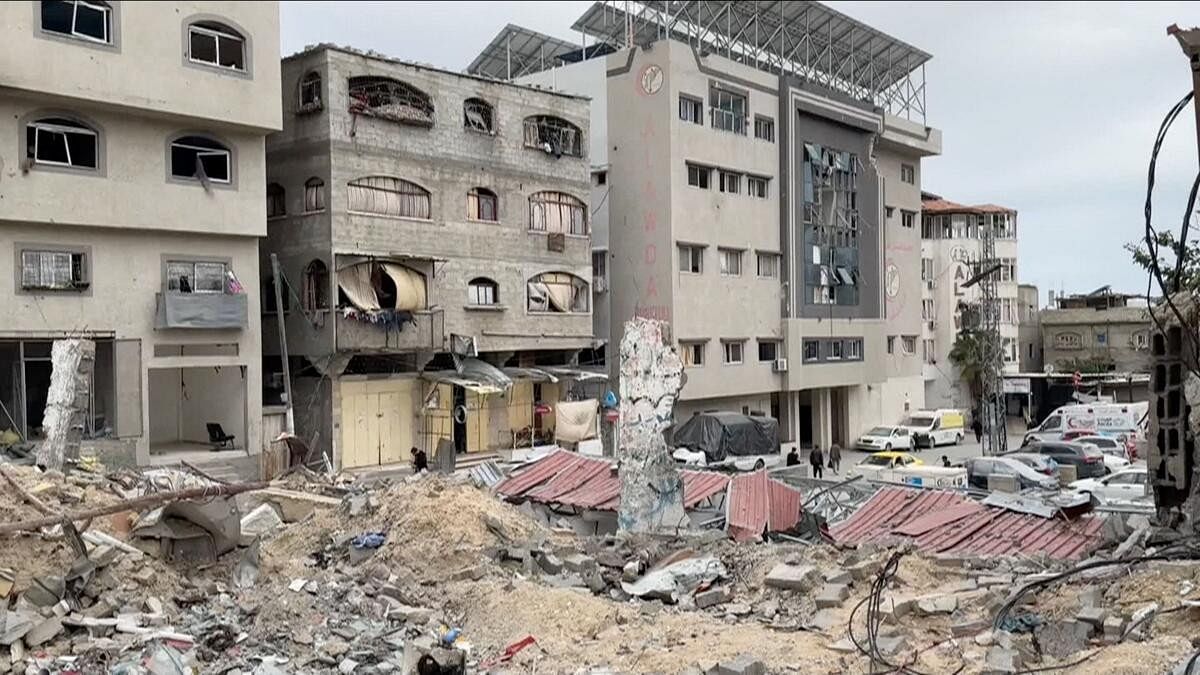 <div class="paragraphs"><p>A view of damage to the facade of Al-Awda Hospital, amid the ongoing conflict between Israel and Hamas, in Gaza</p></div>