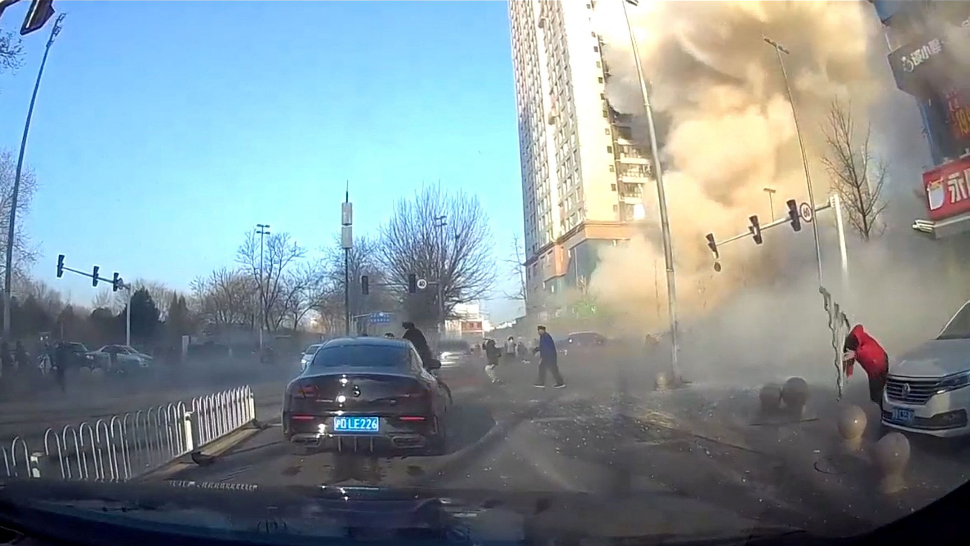 <div class="paragraphs"><p>A dashcam view shows people fleeing following an explosion in Sanhe, Langfang City, Hebei Province, China in this screen grab from video obtained by Reuters March 13, 2024. </p></div>