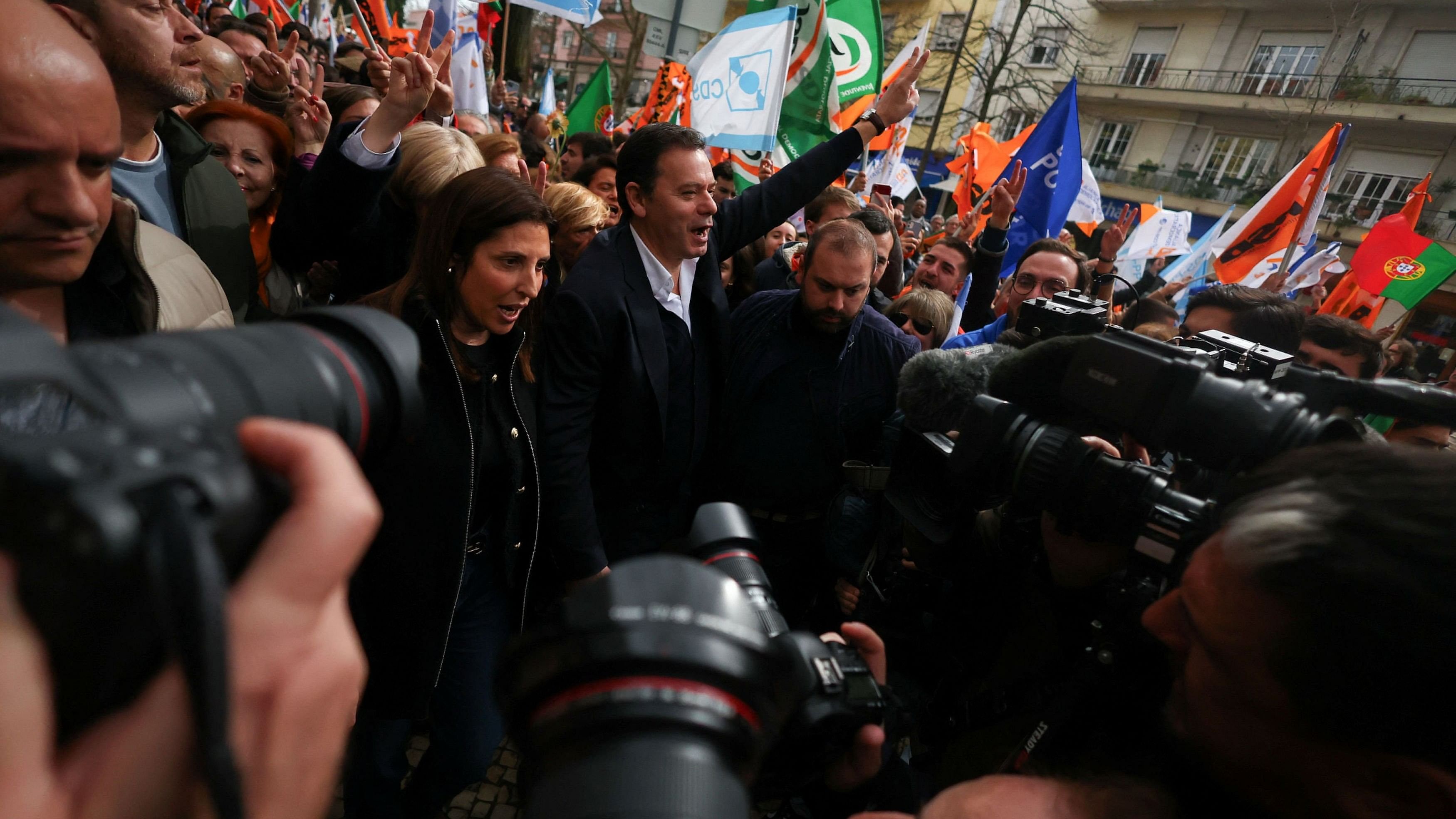 <div class="paragraphs"><p>Social Democratic  leader Luis Montenegro gestures at the crowd during a rally on the last day of the campaign ahead of the snap elections in Lisbon, Portugal.</p></div>