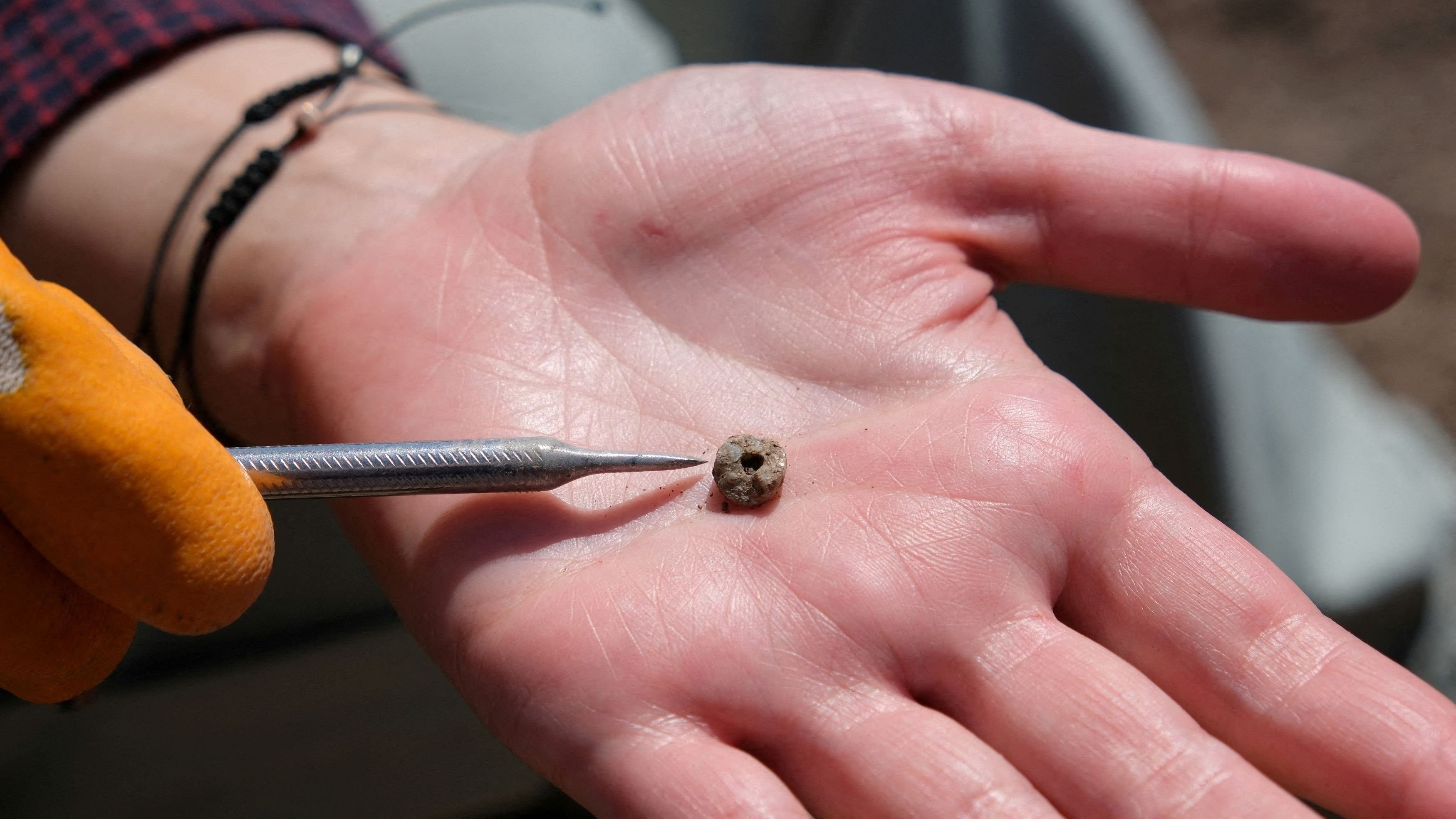 <div class="paragraphs"><p>A stone bead excavated from a grave at Boncuklu Tarla in Mardin province, southeastern Turkey, is pictured in 2023.</p></div>