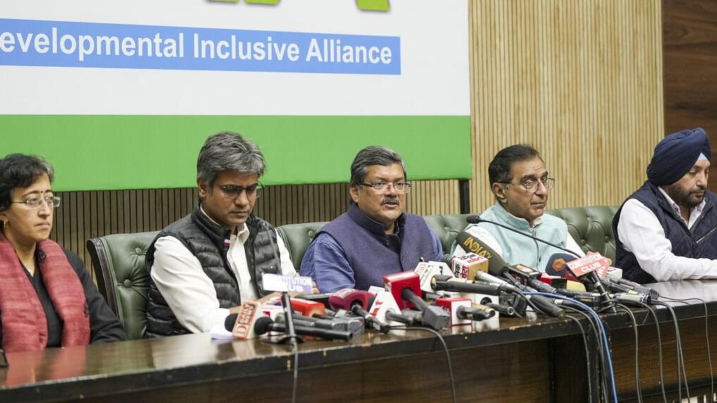 <div class="paragraphs"><p>File photo of AAP leaders Atishi Singh and Sandeep Pathak with Congress leaders Mukul Wasnik, Deepak Babaria and Arvinder Singh Lovely during a joint press conference, in New Delhi.</p></div>