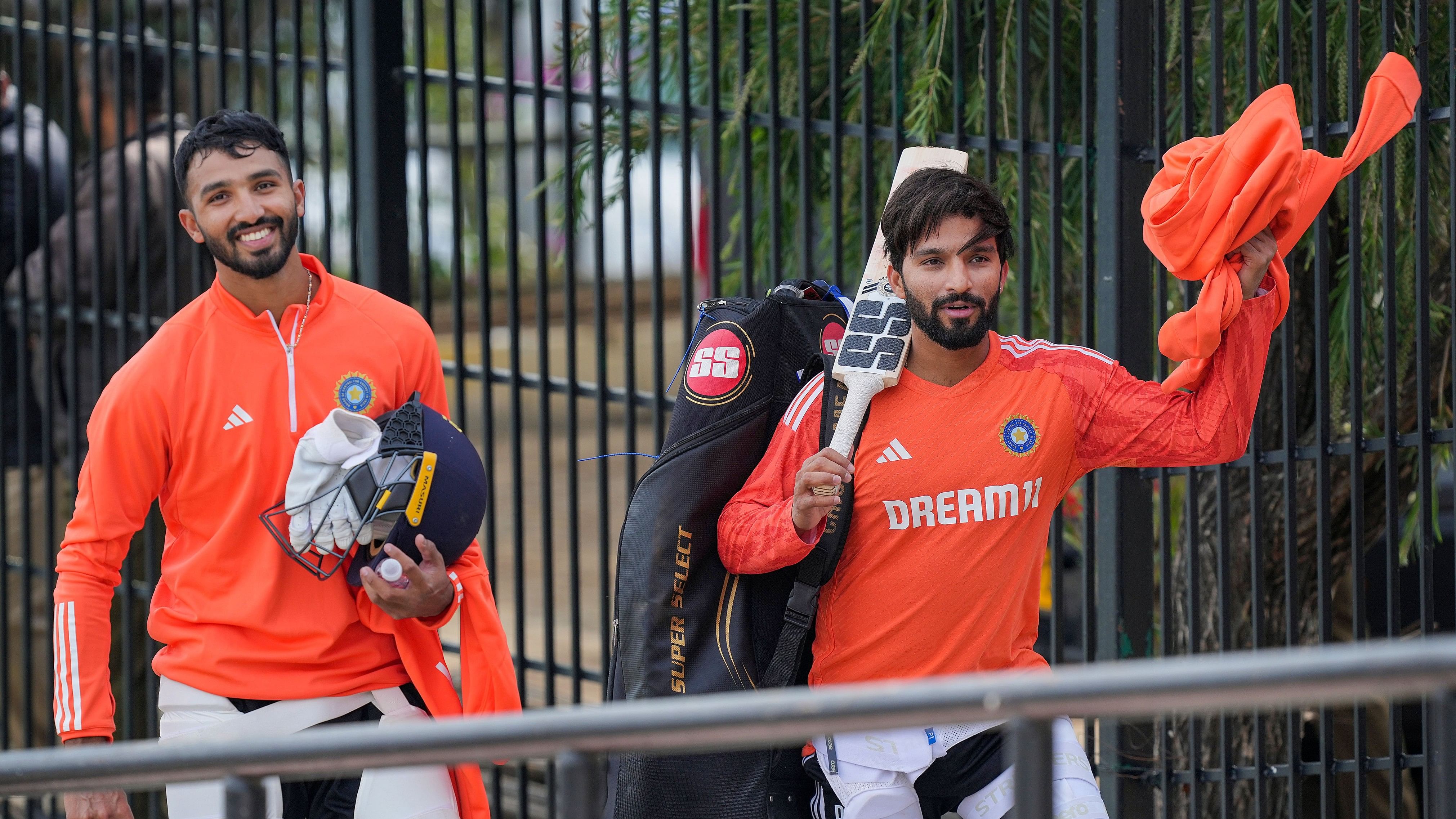 <div class="paragraphs"><p>India's Devdutt Padikkal (left) and Rajat Patidar are all smiles as they head for a stint at Tuesday's 'nets' in Dharamsala. </p></div>
