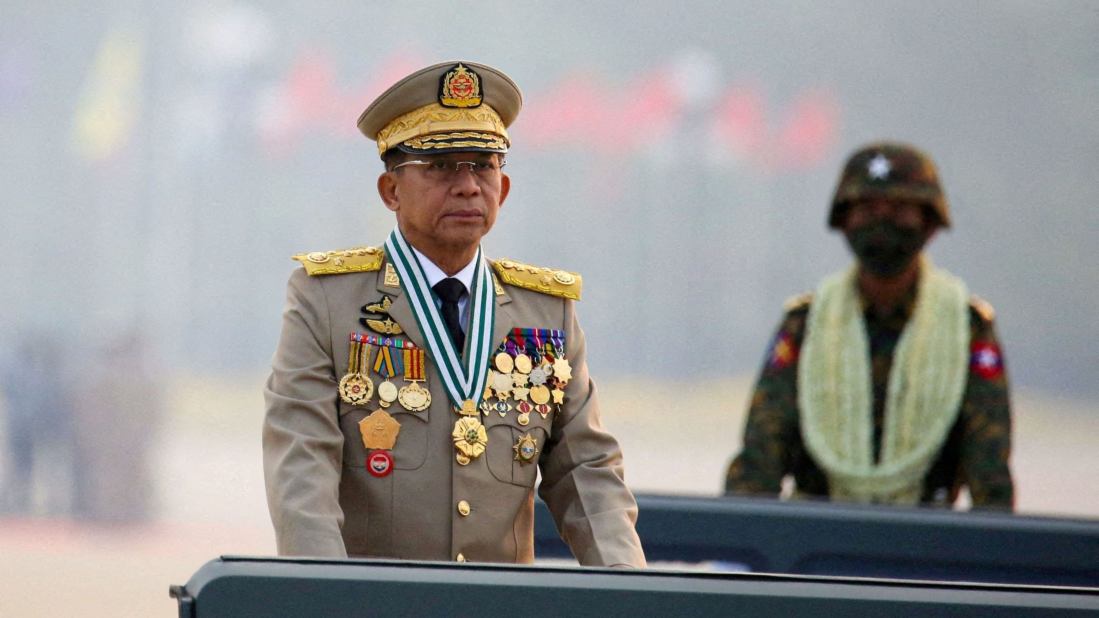 <div class="paragraphs"><p>File Photo: Myanmar's junta chief Senior General Min Aung Hlaing, who ousted the elected government in a coup on February 1, 2021, presides over an army parade on Armed Forces Day in Naypyitaw, Myanmar, March 27, 2021. </p></div>