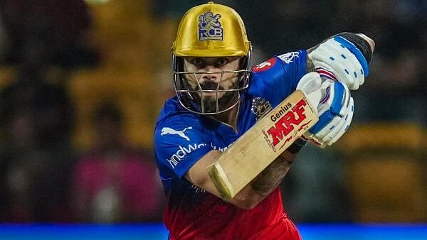 <div class="paragraphs"><p>Royal Challengers Bengaluru batter Virat Kohli plays a shot during the Indian Premier League (IPL) 2024 T20 cricket match between Royal Challengers Bangalore and Punjab Kings at M Chinnaswamy Stadium, in Bengaluru, Monday, March 25, 2024.</p></div>