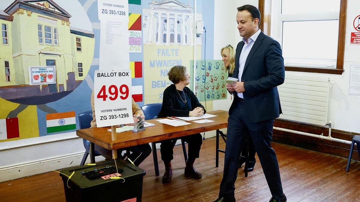 <div class="paragraphs"><p>Ireland's Taoiseach (Prime Minister) Leo Varadkar walks to cast his vote in a referendum on changes to the Irish constitution called the Family Amendment and the Care Amendment, at Scoil Treasa Naofa in Dublin.</p></div>