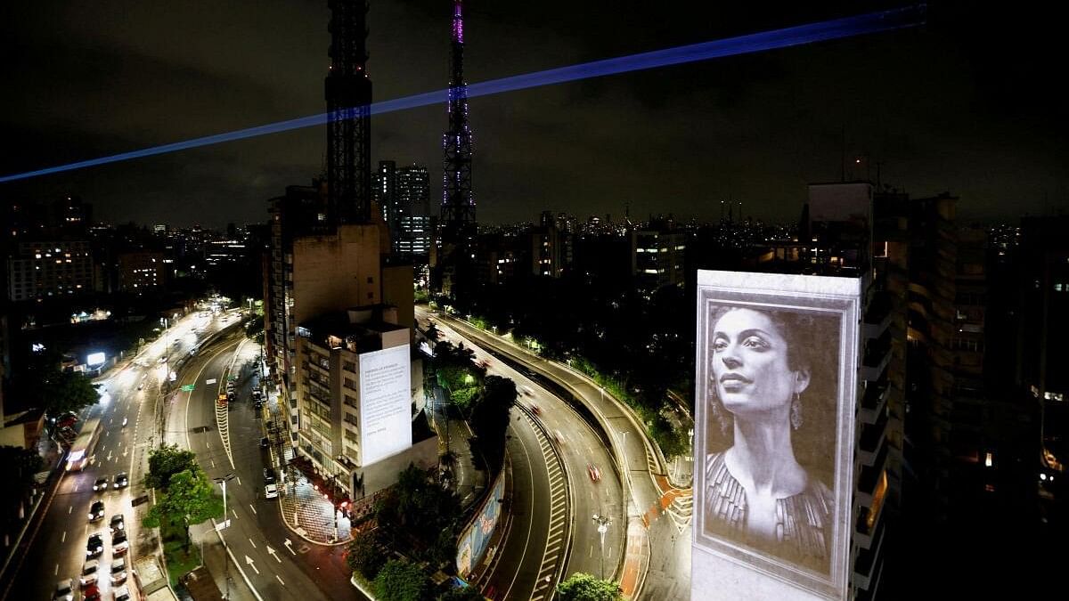 <div class="paragraphs"><p>An image of late activist and councilwoman Marielle Franco is projected onto a building during a tribute to mark the fifth anniversary of her murder, in Sao Paulo, Brazil.</p></div>