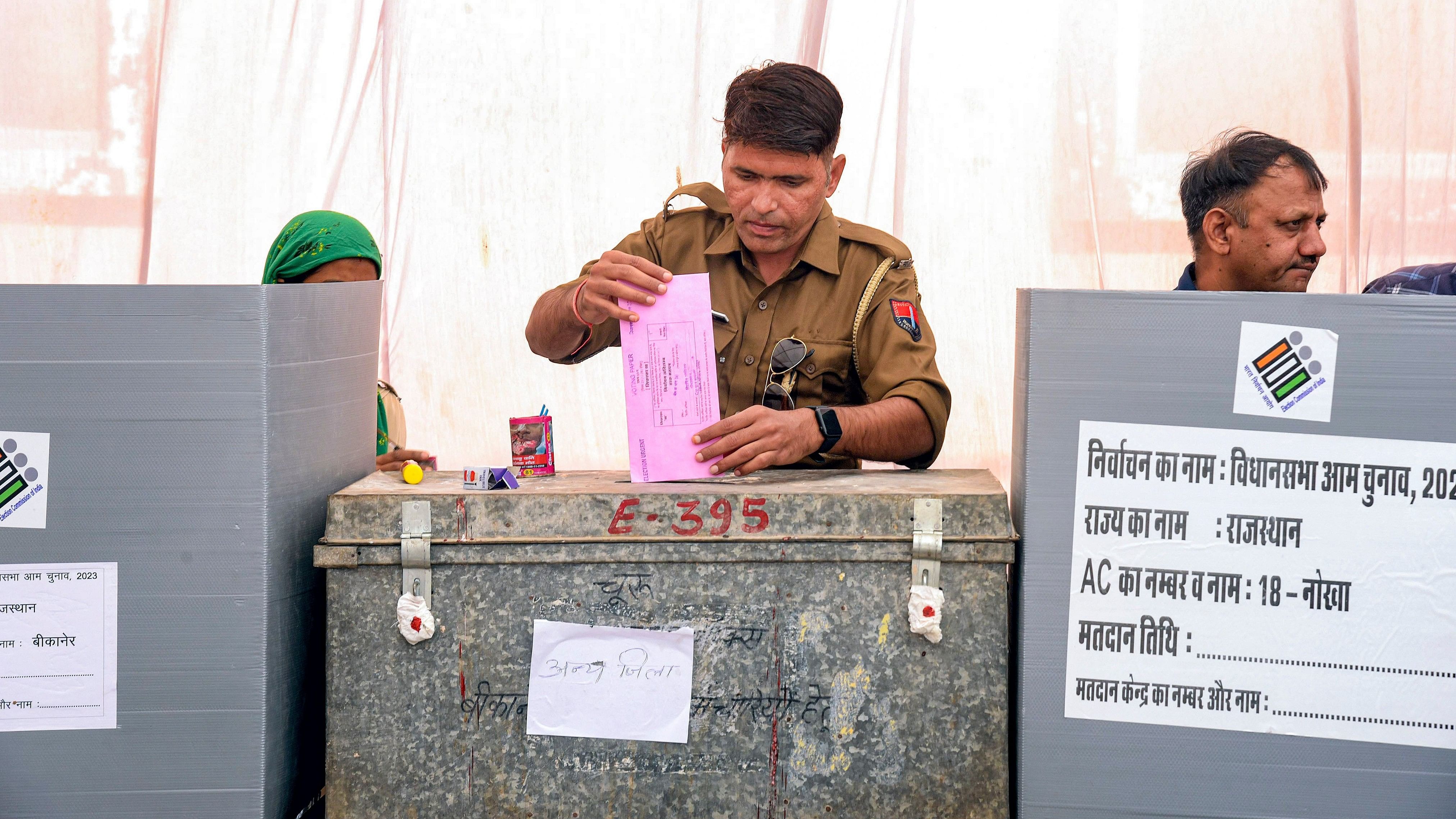 <div class="paragraphs"><p>File photo of aRajasthan Police personnel casting his postal ballot.</p></div>