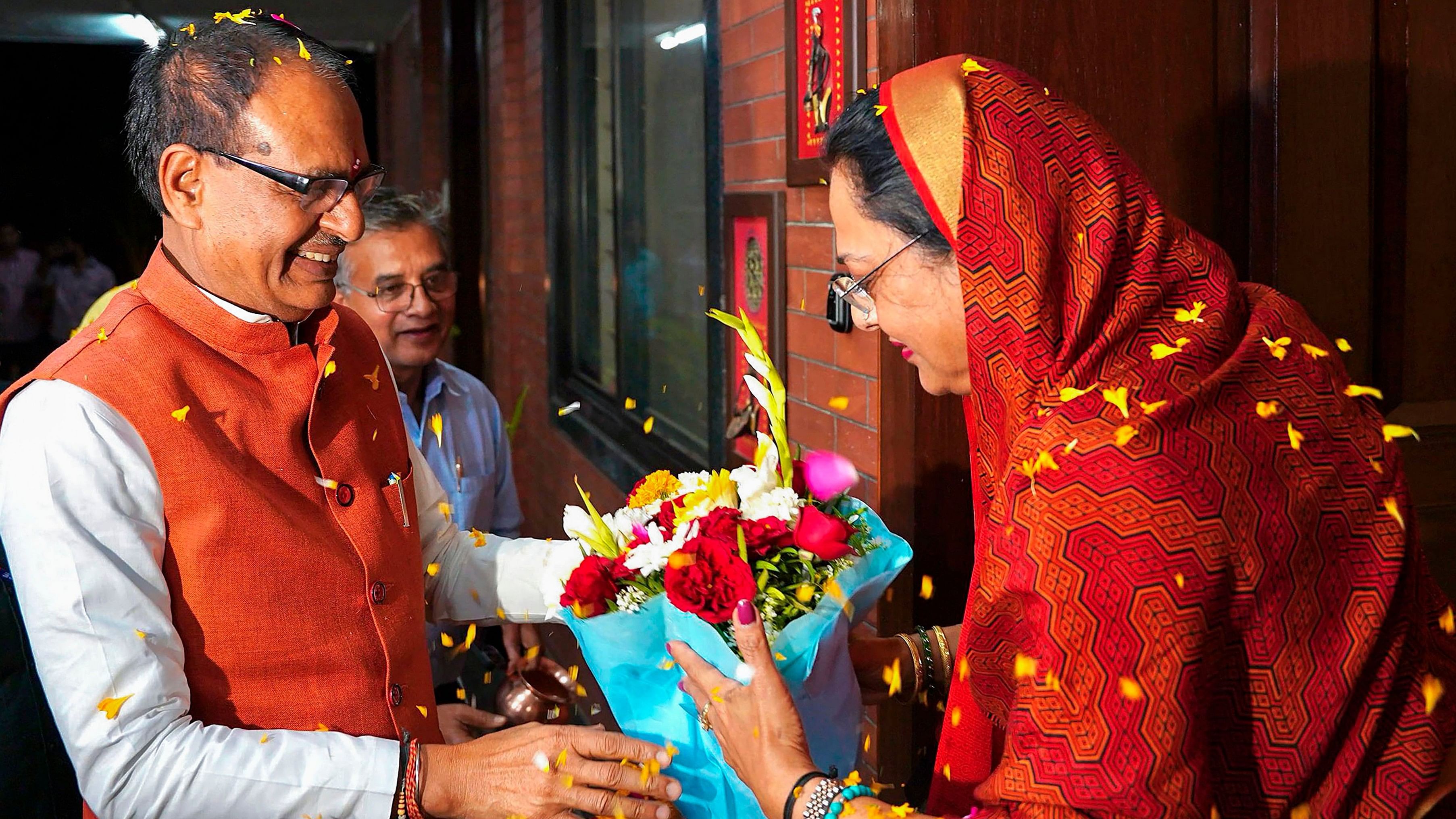 <div class="paragraphs"><p>BJP leader and former Madhya Pradesh chief minister Shivraj Singh Chouhan being congratulated after being named to contest from Vidisha seat in the Lok Sabha elections. </p></div>