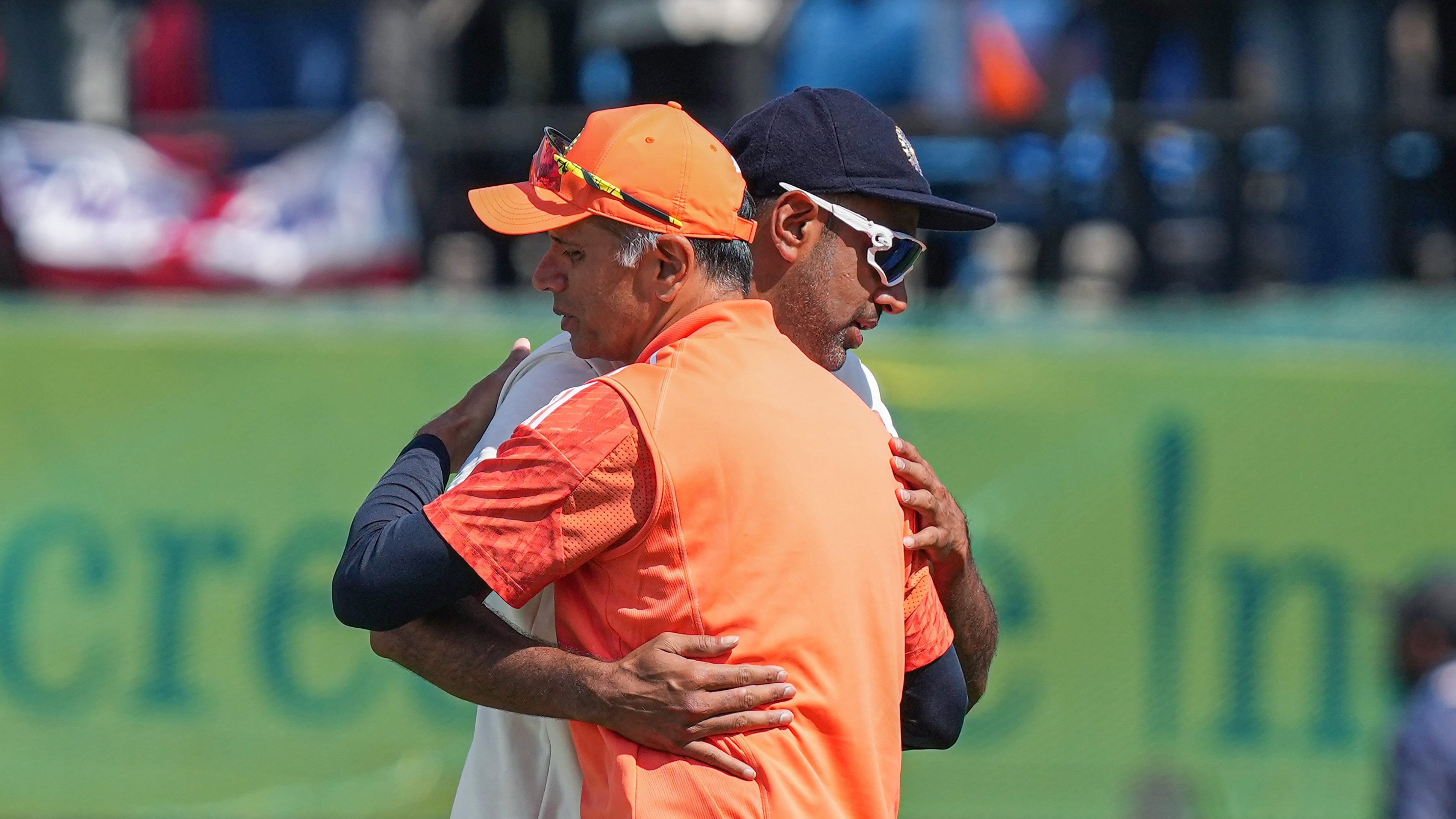 <div class="paragraphs"><p>Coach Rahul Dravid with R Ashwin after the team won the fifth Test cricket match over England, in Dharamsala.</p></div>