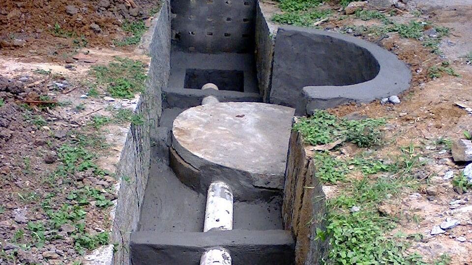 A sample recharge well built along the road to capture rainwater, equipped with an in-drain filter.