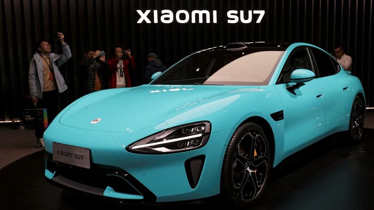 <div class="paragraphs"><p>Xiaomi's first electric vehicle, the SU7, displayed at an event in Beijing, China</p></div>