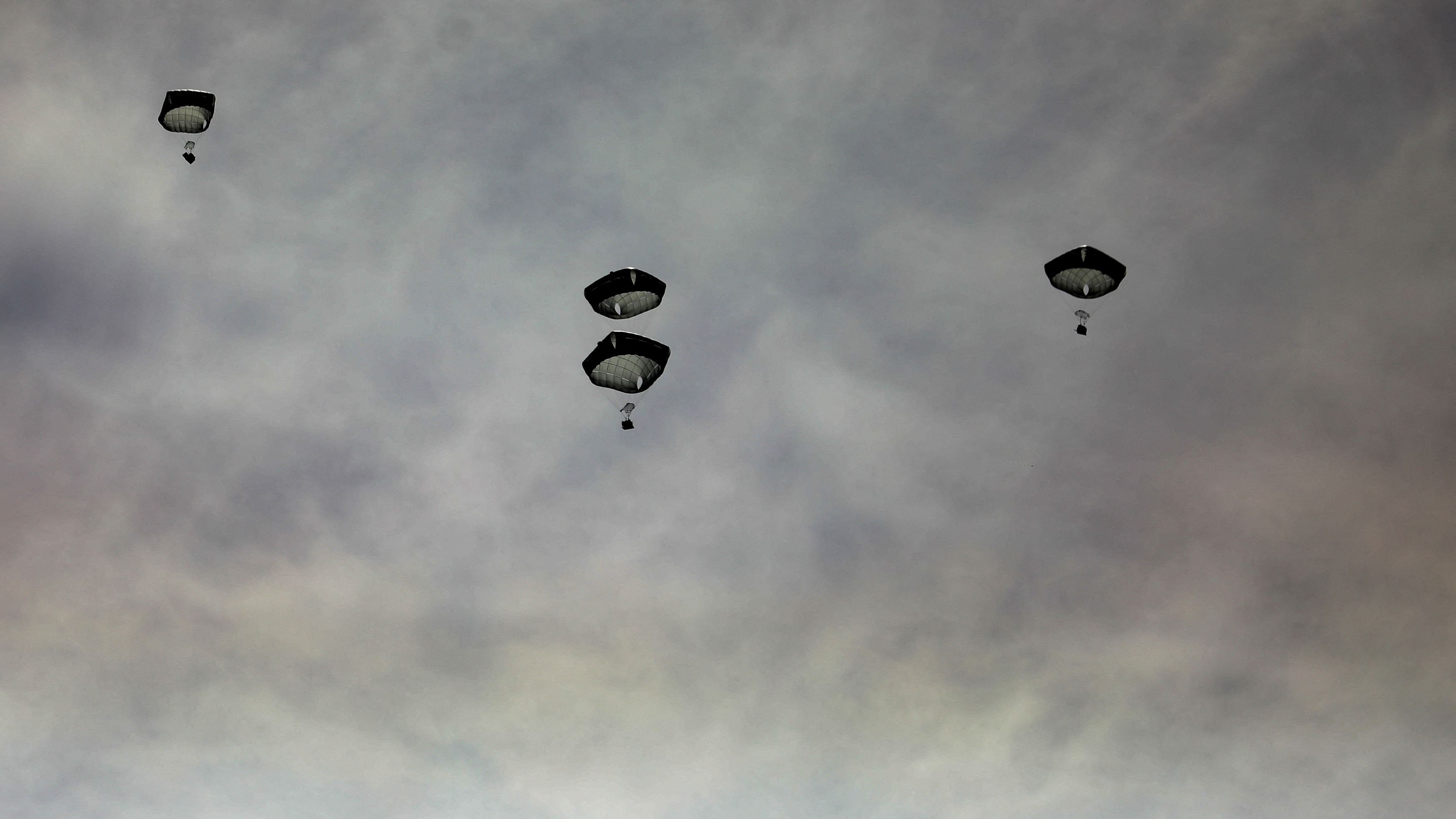 <div class="paragraphs"><p>Aid is air-dropped over Gaza, amid the ongoing the conflict between Israel and Hamas, in Gaza City, March 1, 2024. REUTERS/Kosay Al Nemer/File Photo</p></div>