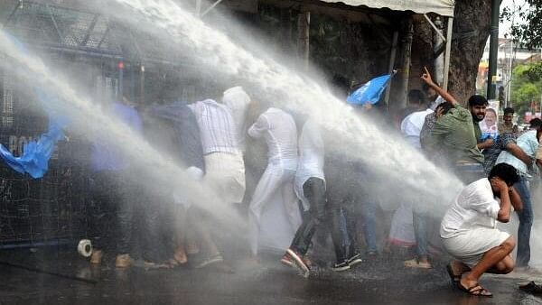 <div class="paragraphs"><p>Water cannon being used by the police to disperse the KSU activists during their protest over the arrest of the SFI students in an alleged in connection with the recent death of a student of the Kerala Veterinary and Animal Sciences University, in Thiruvananthapuram, March 1, 2024.</p></div>