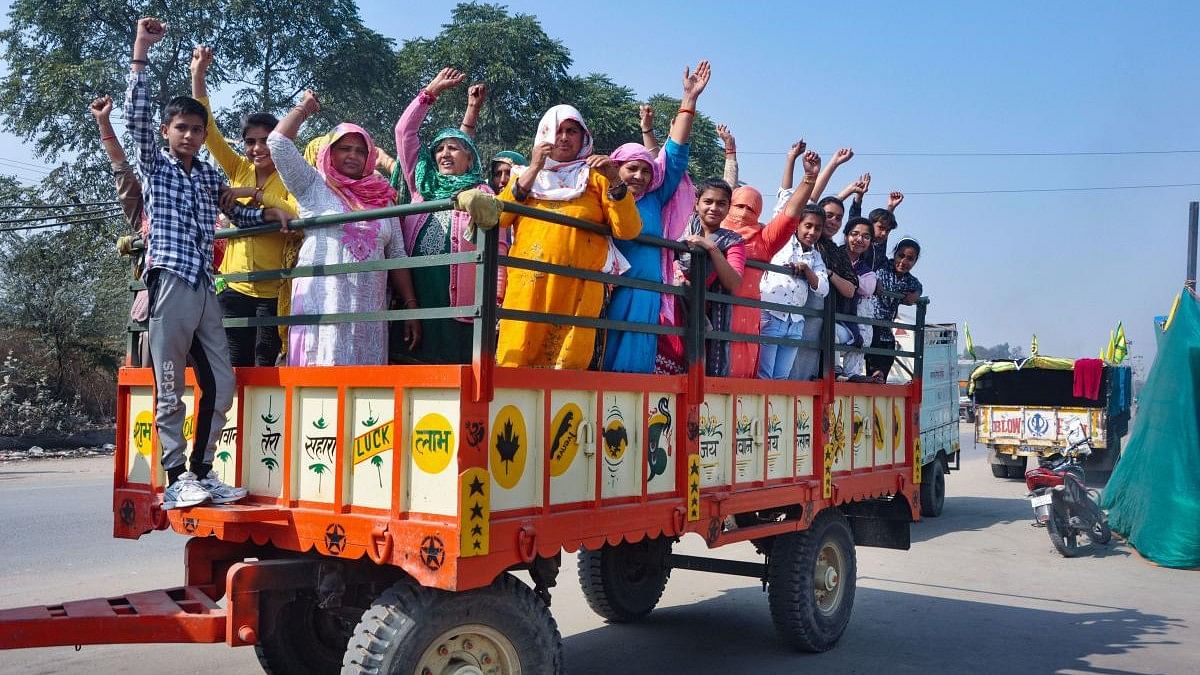 <div class="paragraphs"><p>Representative image of women in a tractor.</p></div>