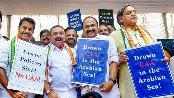 <div class="paragraphs"><p>Congress leaders Shashi Tharoor, Opposition leader VD Satheesan, UDF convenor MM Hassan and MP Adoor Prakash during a protest organised by the party outside the Kerala Rajbhavan after the central government notified the rules for implementation of the Citizenship (Amendment) Act, 2019, in Thiruvananthapuram, Wednesday, March 13, 2024. </p></div>