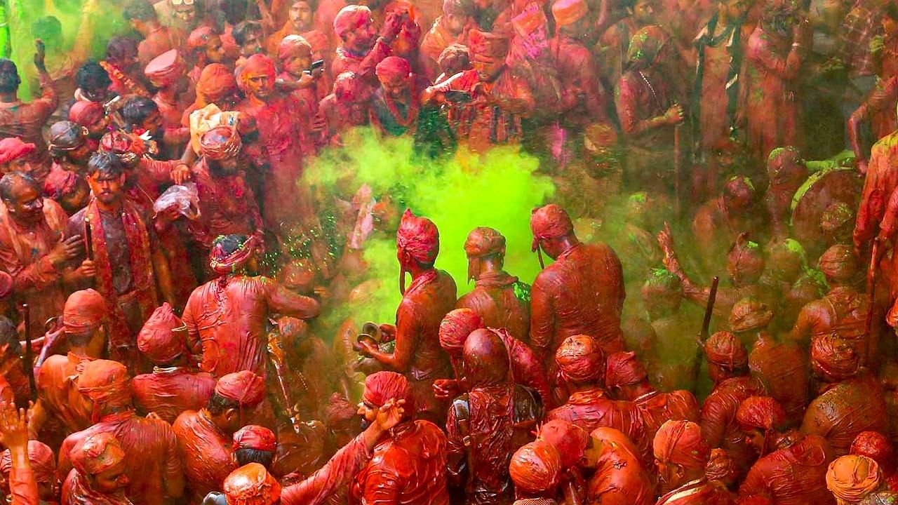<div class="paragraphs"><p>People daubed in colours during 'Lathmar Holi' celebrations at Sriji Temple in Barsana town near Mathura.</p></div>