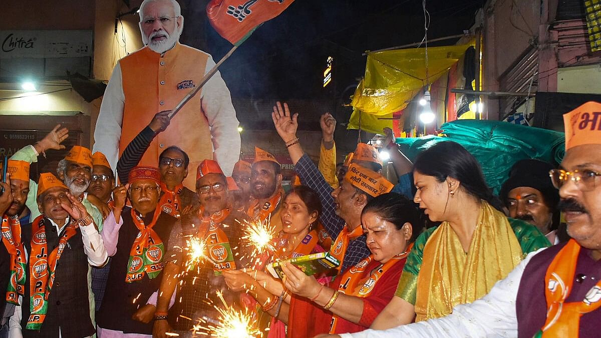 <div class="paragraphs"><p>BJP workers celebrate the announcement of Prime Minister Narendra Modi contesting from Varanasi for the third time after BJP released its first list of candidates for the upcoming Lok Sabha elections.</p></div>
