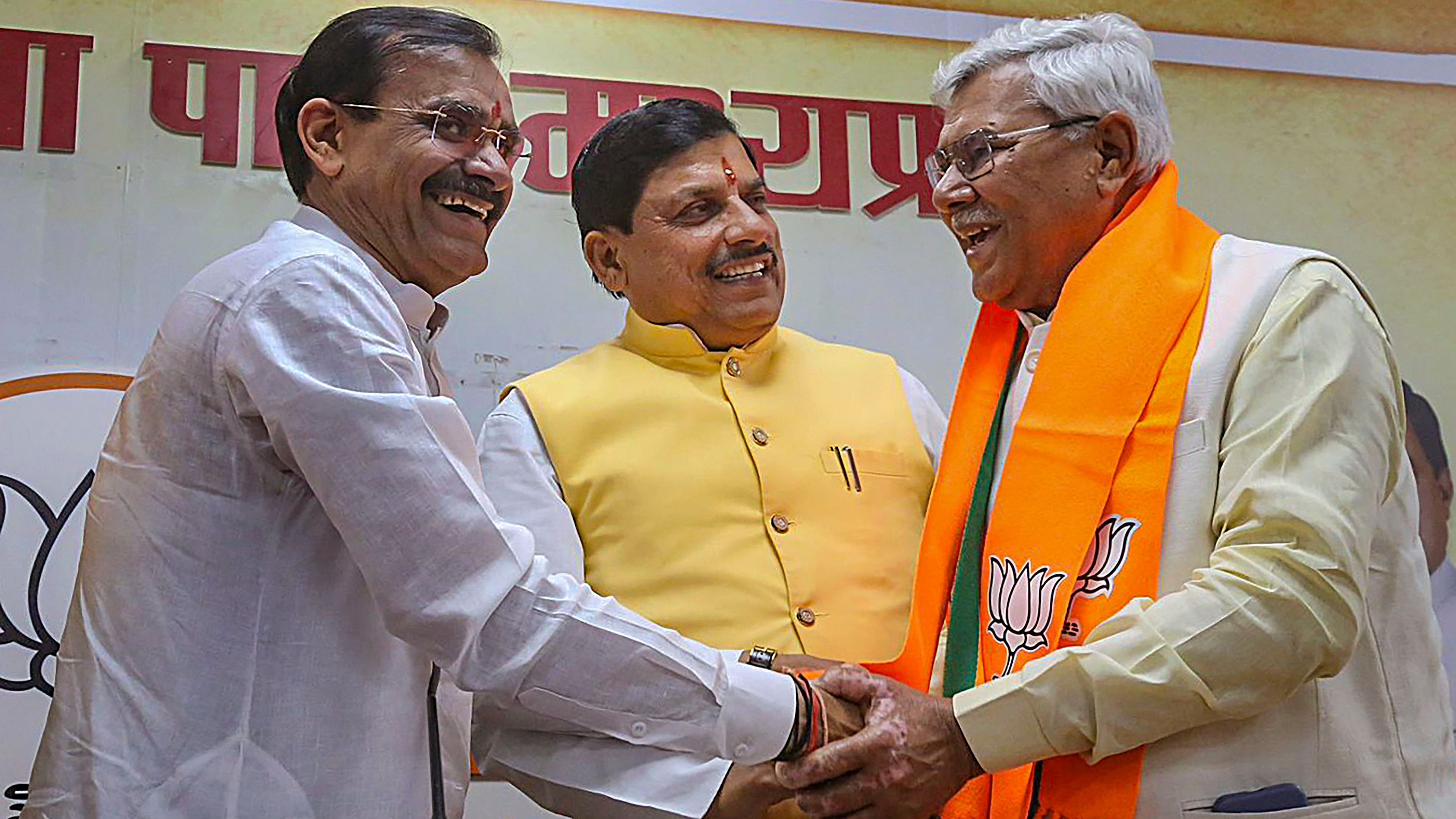 <div class="paragraphs"><p>Madhya Pradesh Chief Minister Mohan Yadav and BJP MP President VD Sharma with former Congress leader Ram Lakhan Singh after the latter joined BJP, on Thursday.</p></div>
