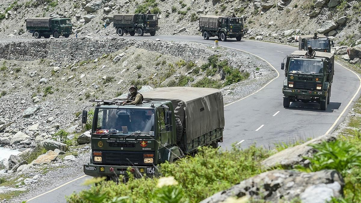 <div class="paragraphs"><p>Army convoy moves along the Srinagar-Leh National highway.</p></div>