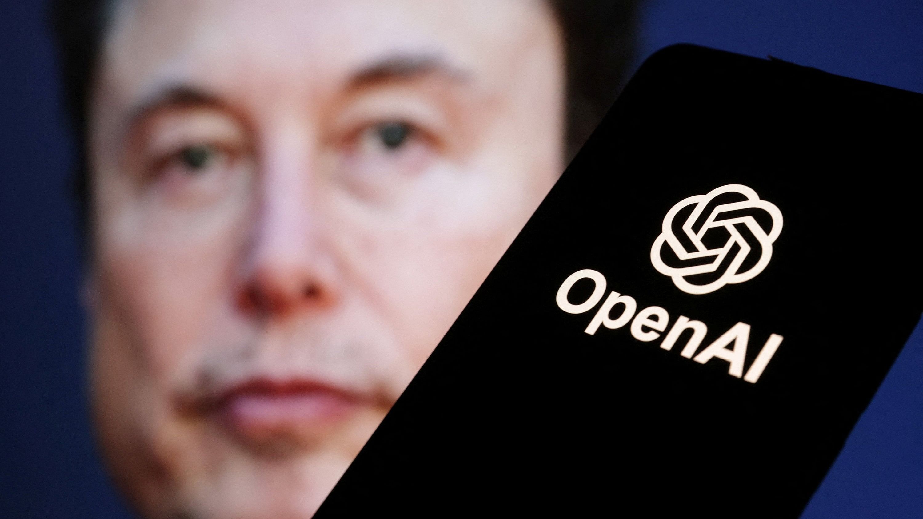 <div class="paragraphs"><p>OpenAI logo is seen in front of Elon Musk photo in this illustration taken March 11, 2024. </p></div>