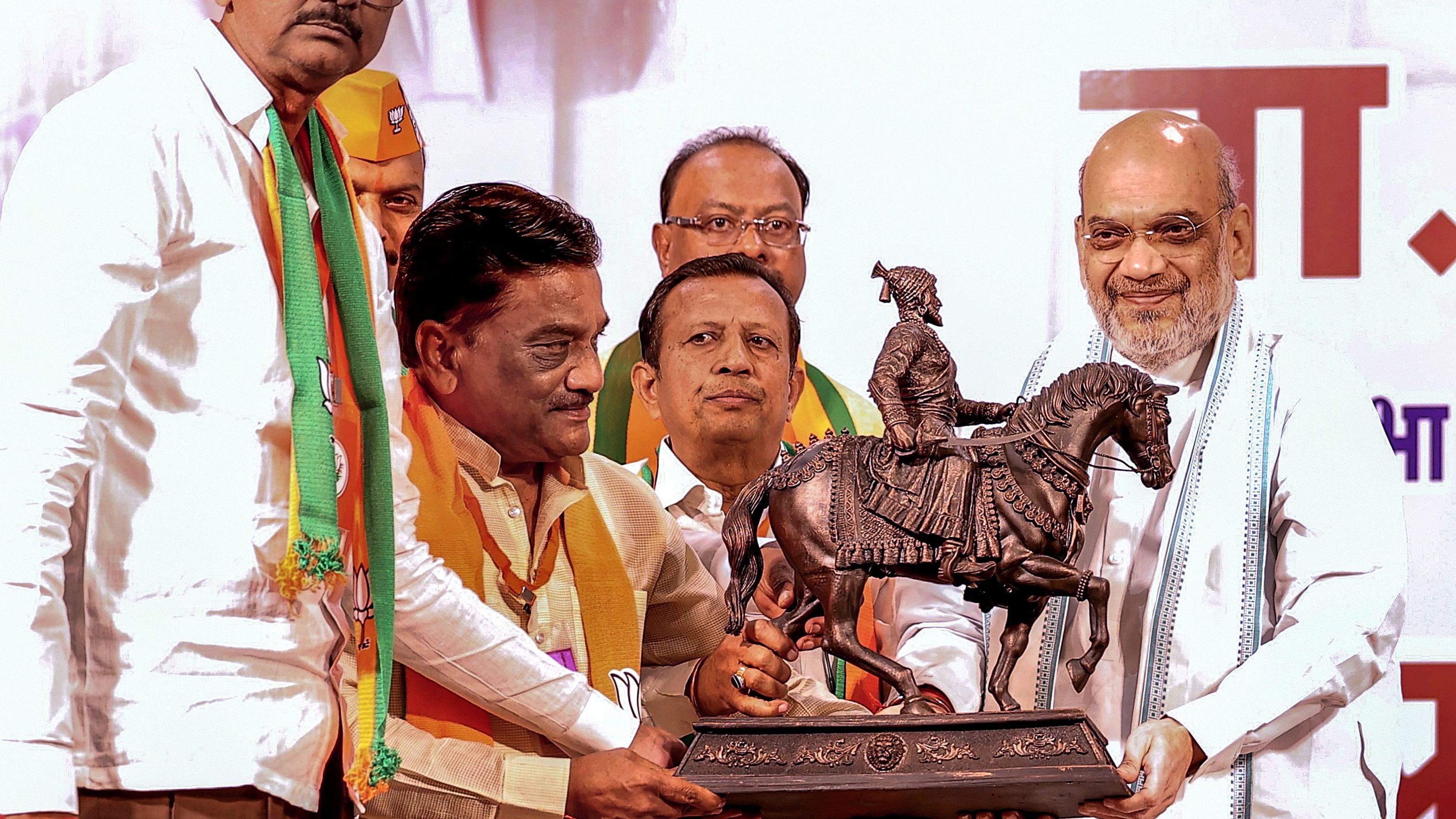 <div class="paragraphs"><p>Union Home Minister Amit Shah being felicitated by BJP workers during the BJP Lok Sabha Election Management Committee and Lok Sabha Core Committee meeting, in Akola, on Tuesday.</p></div>