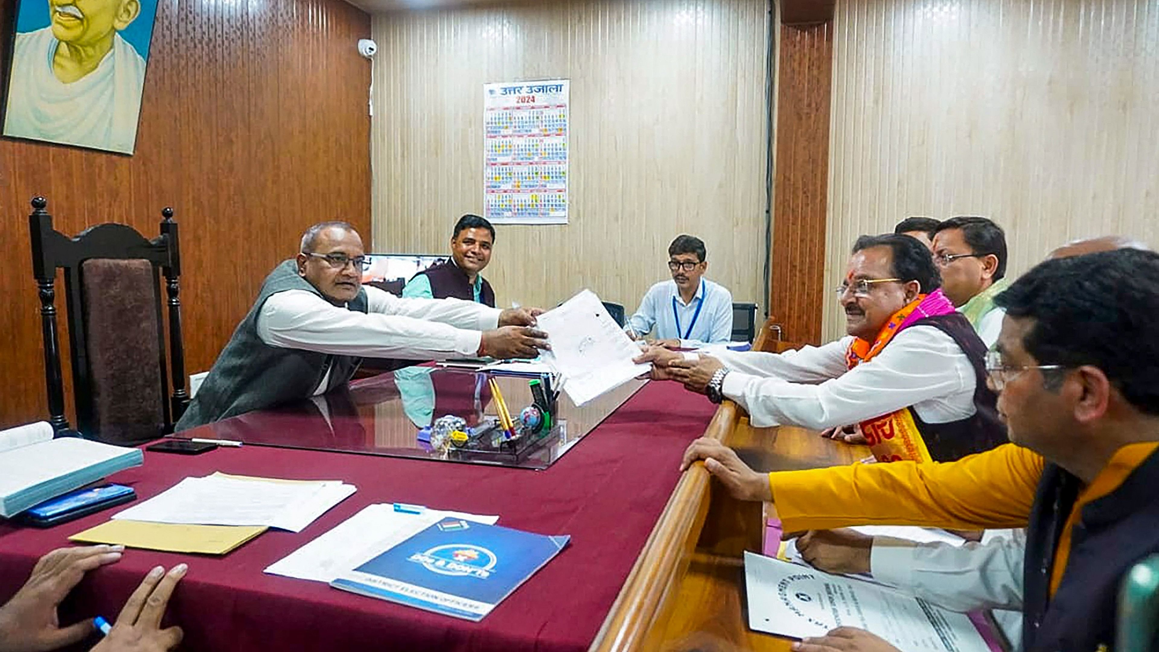 <div class="paragraphs"><p> Rudrapur: BJP candidate Ajay Bhatt from Nainital-Udham Singh Nagar constituency files his nomination for the Lok Sabha polls, in Rudrapur, Wednesday, March 27, 2024. Uttarakhand Chief Minister Pushkar Singh Dhami is also seen.</p></div>