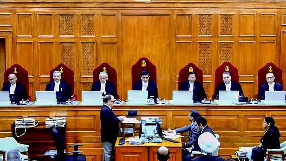 <div class="paragraphs"><p>The seven-judge constitution bench headed by Chief Justice of India D.Y. Chandrachud during pronouncement of verdict on bribes and corruption by legislators, Monday, March 4, 2024. The apex court Monday observed that MPs and MLAs taking bribes to vote or make a speech in the House are not immune from prosecution. </p></div>