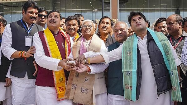 <div class="paragraphs"><p>Madhya Pradesh Governor Mangubhai C Patel, along with Union Minister for Civil Aviation Jyotiraditya Scindia and MP Chief Minister Mohan Yadav, unveils a statue of former MP Vijaya Raje Scindia, at the new Rajmata Vijayaraje Scindia Airport, in Gwalior at the inauguration event on March 10, 2024.</p></div>