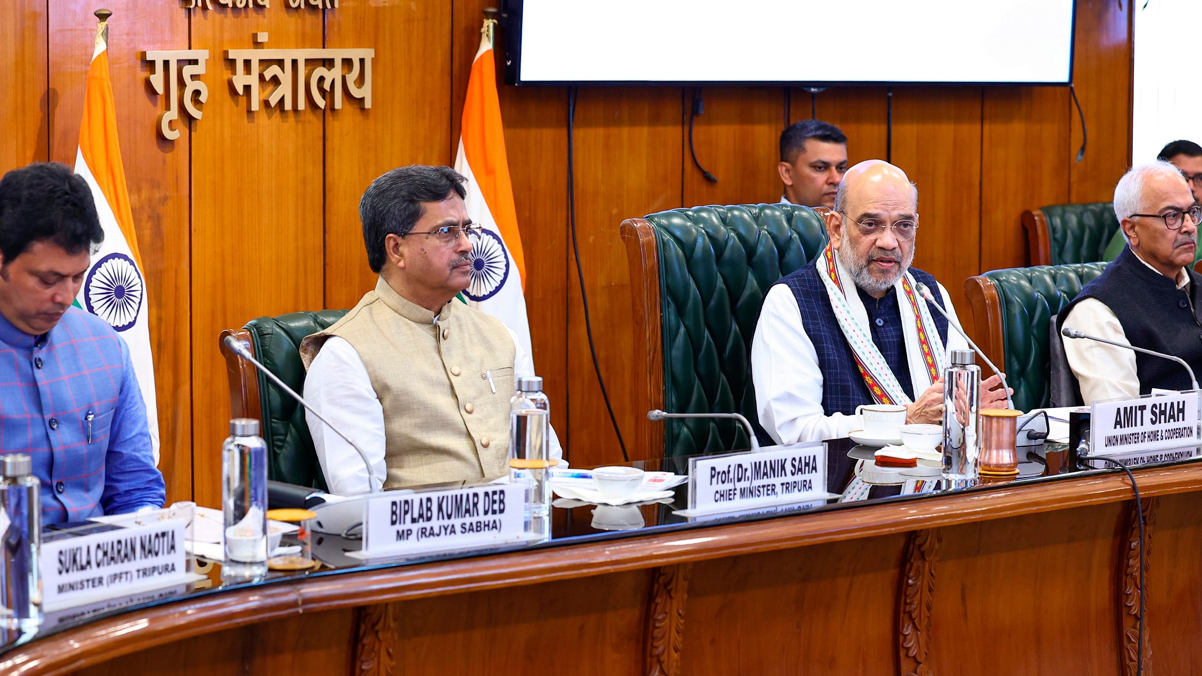 <div class="paragraphs"><p>Union Home Minister Amit Shah with Tripura Chief Minister Manik Saha and others during the signing of the agreement between TIPRA Motha and the governments of Tripura and India, in New Delhi, Saturday, March 2, 2024. </p></div>