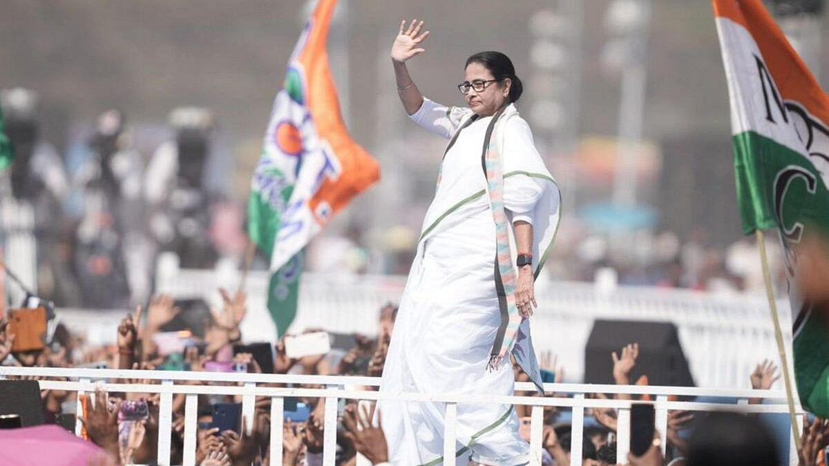 <div class="paragraphs"><p>TMC chief and West Bengal Chief Minister Mamata Banerjee waves to the crowd during the rally in Kolkata.&nbsp;</p></div>