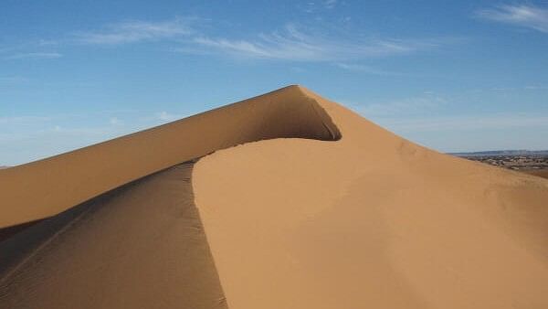 <div class="paragraphs"><p>A view of the Lala Lallia star dune of the Sahara Desert.</p></div>