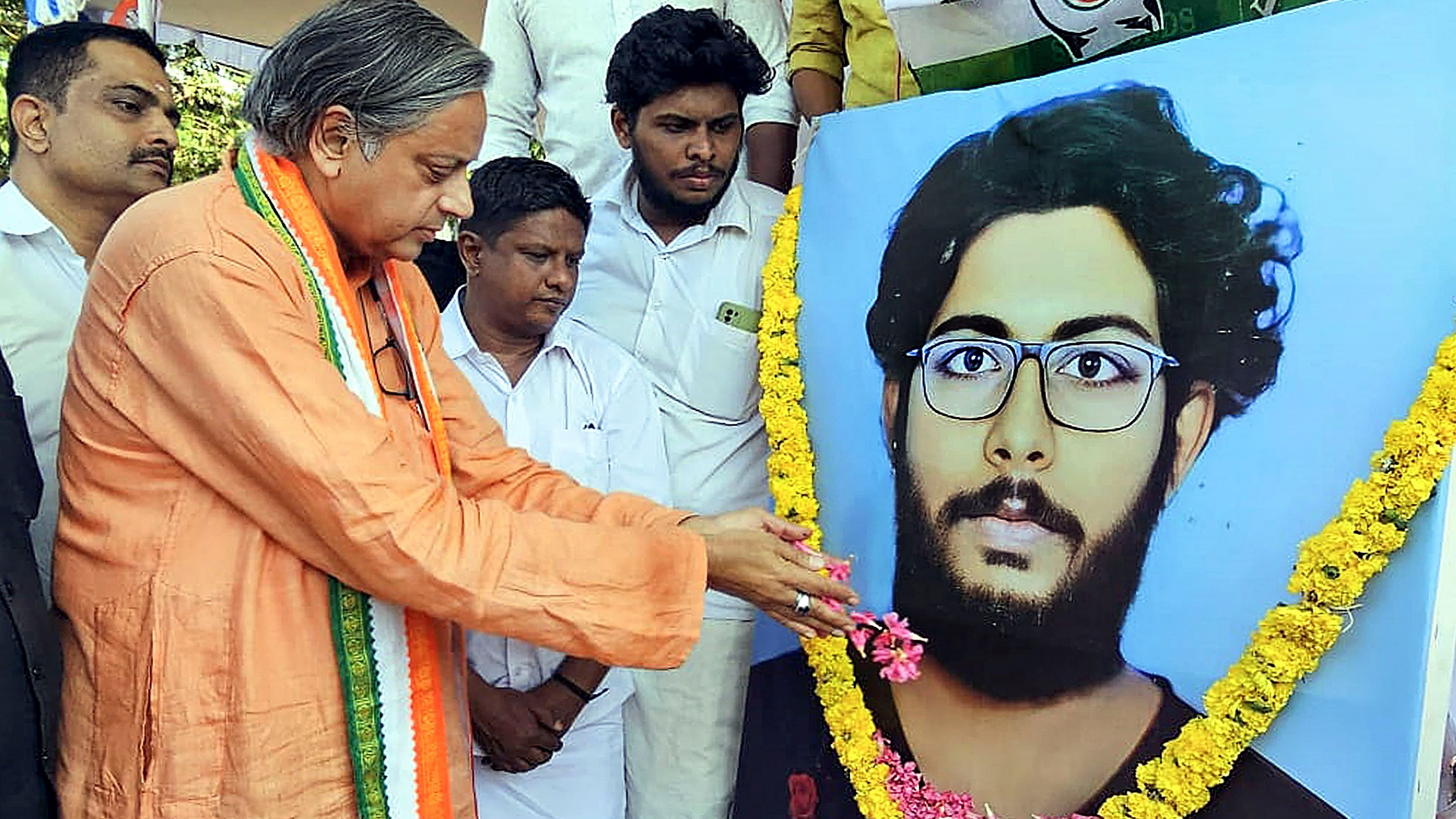 <div class="paragraphs"><p>Thiruvananthapuram: Congress leader Shashi Tharoor pays floral tributes to 20-year-old Siddharthan, a student of the Kerala Veterinary and Animal Sciences University who was found hanging in his hostel bathroom, in Thiruvananthapuram, Saturday, March 2,  2024. </p></div>