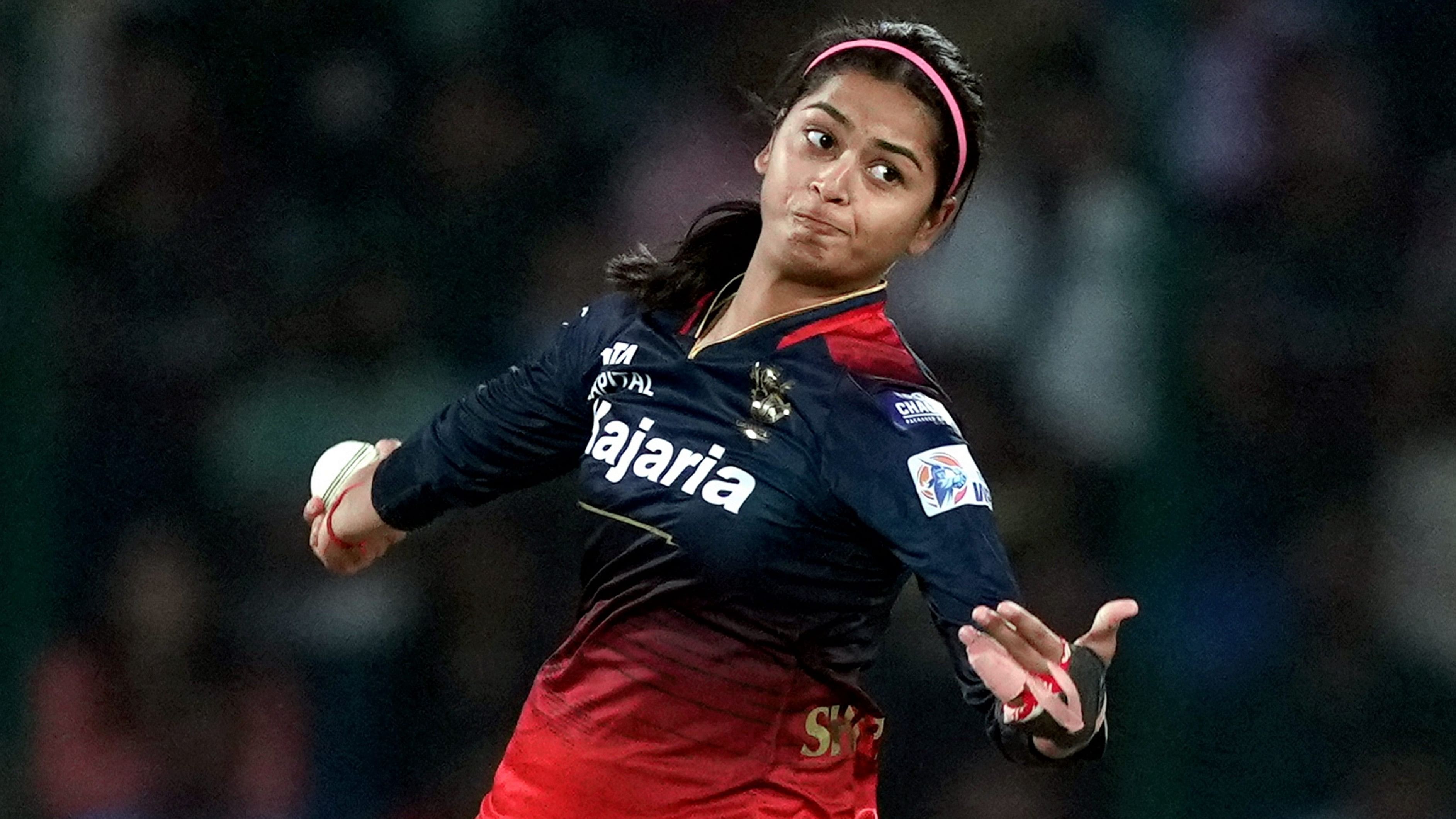 <div class="paragraphs"><p>RCB's Shreyanka Patil bowls during the WPL-T20 final cricket match between Delhi Capitals and Royal Challengers Bangalore at the Arun Jaitley Stadium, in New Delhi, on Sunday.</p></div>