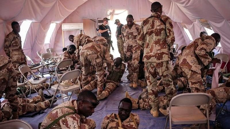 <div class="paragraphs"><p>United States Special Forces troops training Nigerien soldiers in Agadez, Niger, in 2018. </p></div>