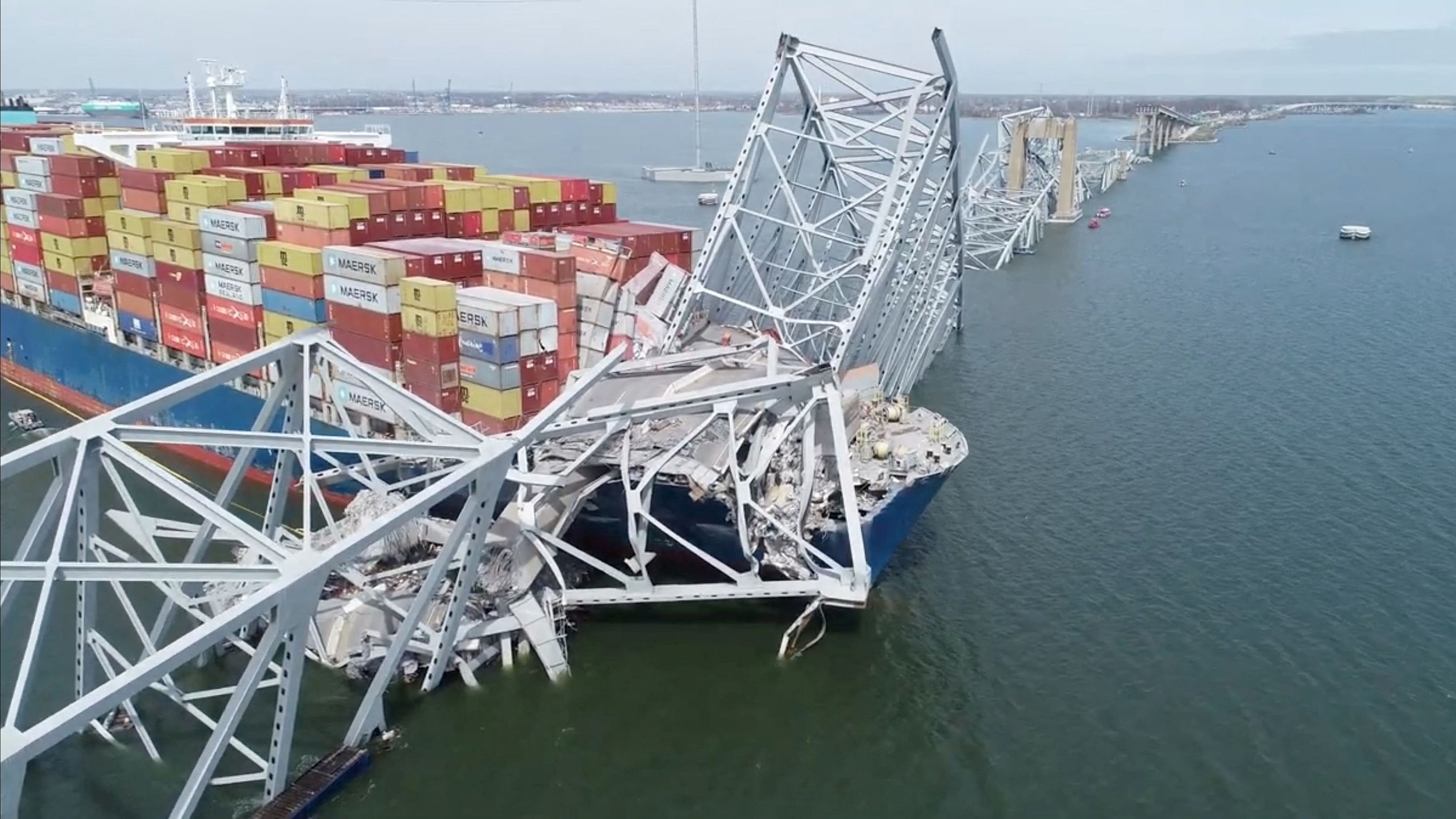 <div class="paragraphs"><p>A drone view of the Dali cargo vessel, which crashed into the Francis Scott Key Bridge causing it to collapse, in Baltimore, Maryland, US, March 26, 2024, in this still image taken from a handout video. </p></div>