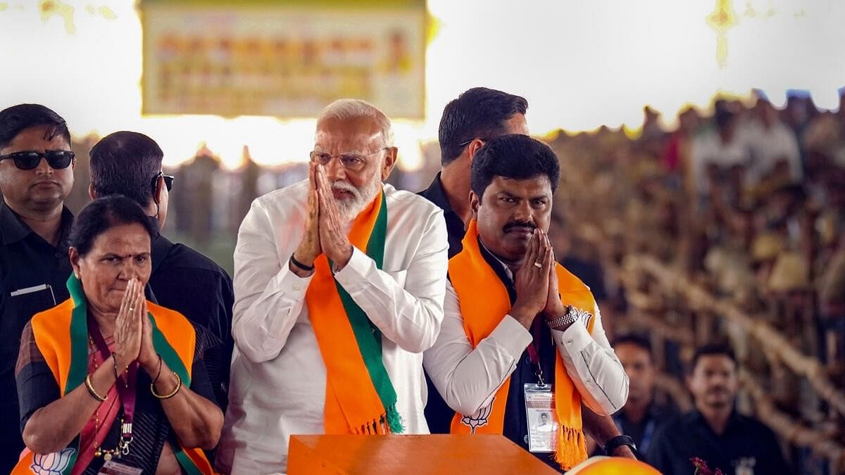 <div class="paragraphs"><p>Prime Minister Narendra Modi greets supporters during an election rally ahead of Lok Sabha polls.&nbsp;</p></div>