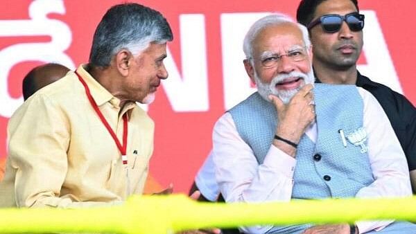 <div class="paragraphs"><p>Prime Minister Narendra Modi with TDP chief N Chandrababu Naidu during a public meeting in Palnadu, Sunday, March 17, 2024.</p></div>
