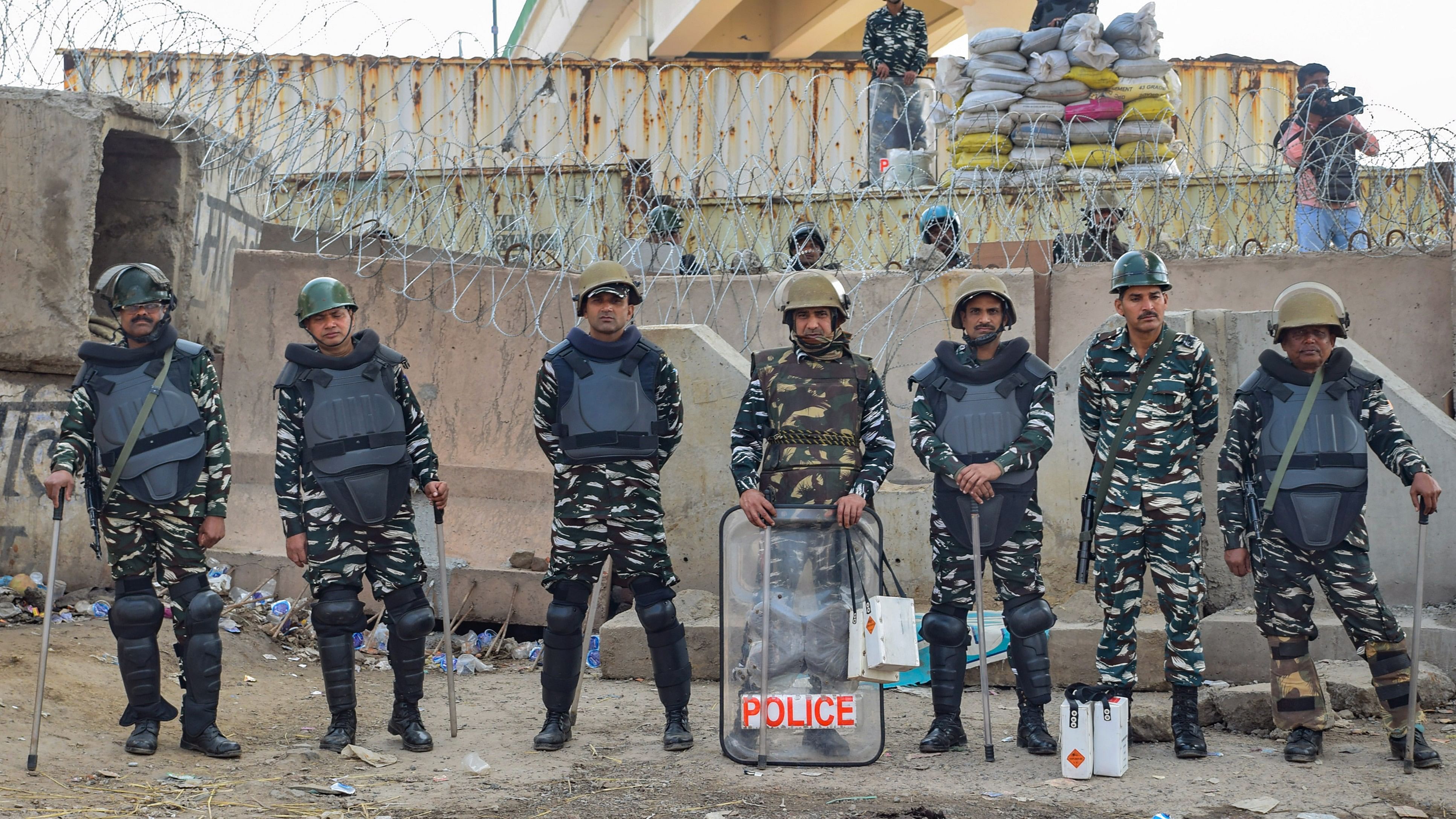 <div class="paragraphs"><p>Security personnel stand guard during the protesting farmers’ ‘Delhi Chalo’</p></div>