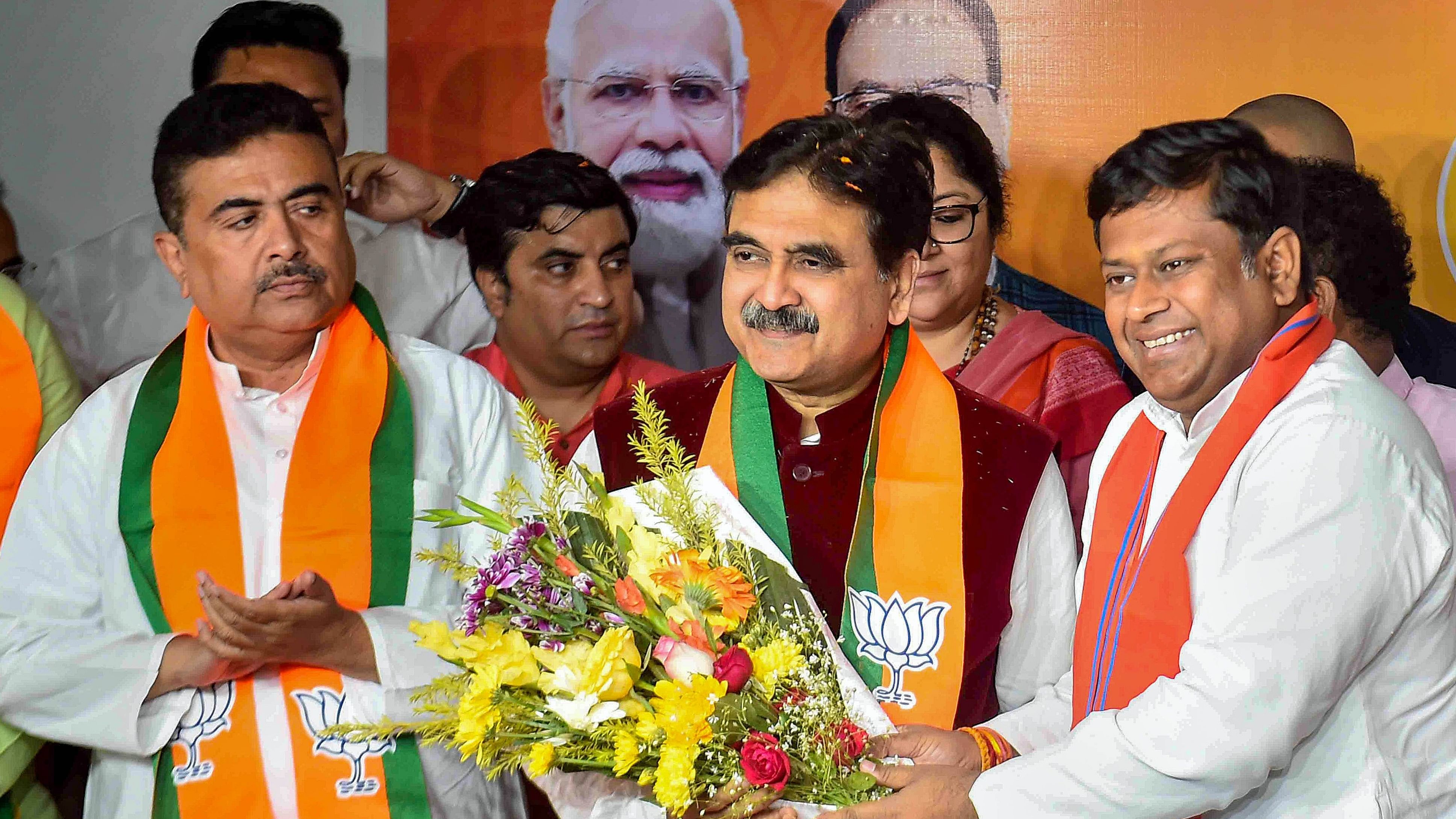 <div class="paragraphs"><p>Kolkata: Former Calcutta High Court judge Justice Abhijit Gangopadhyay joins BJP in the presence of BJP WB President Sukanta Majumdar and Leader of Opposition in State Assembly Suvendu Adhikari, at BJP office, in Kolkata, Thursday, March 7, 2024. </p></div>