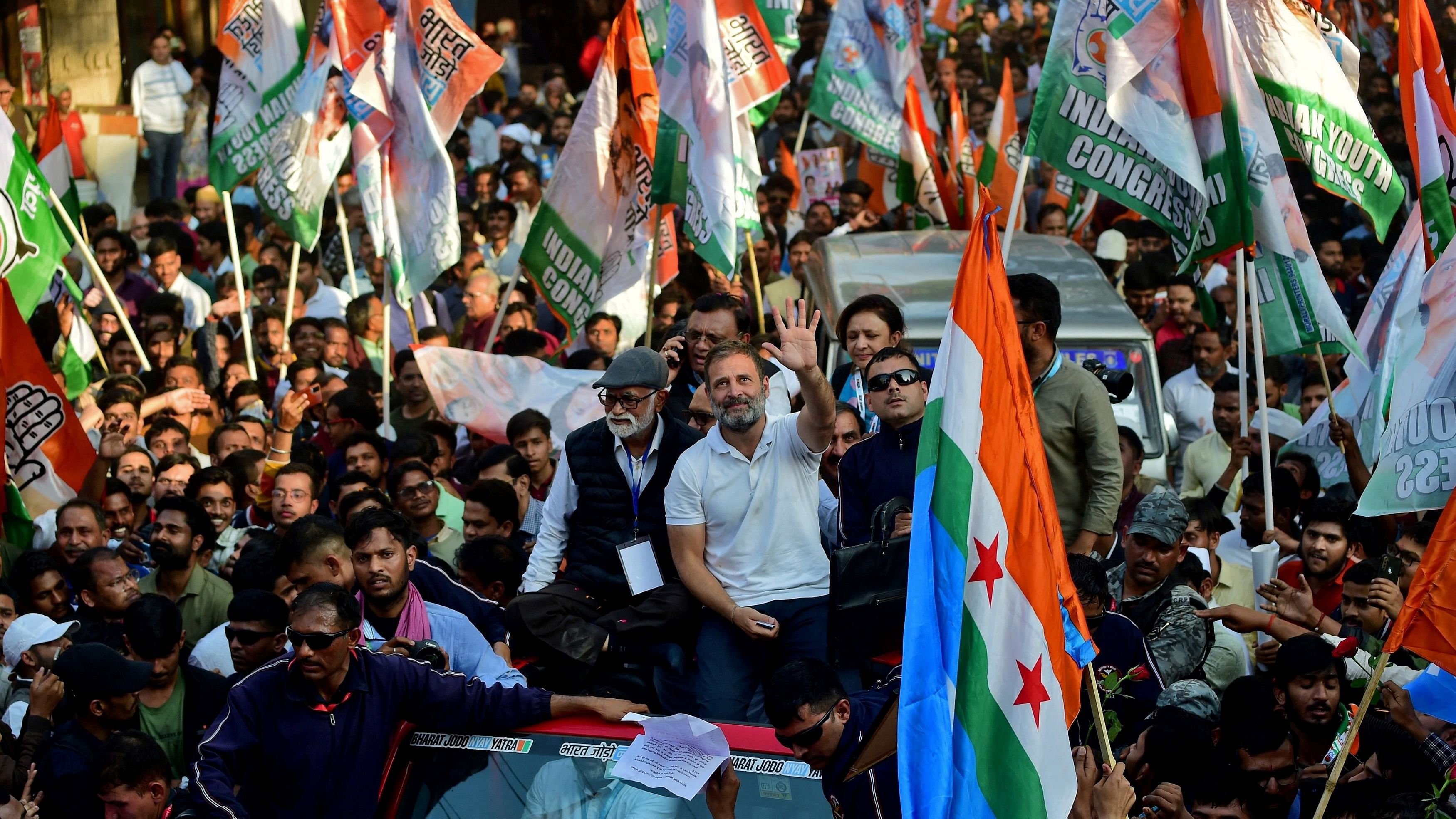 <div class="paragraphs"><p>Rahul Gandhi waves to his supporters at a roadshow during the 'Bharat Jodo Nyay Yatra'.</p></div>