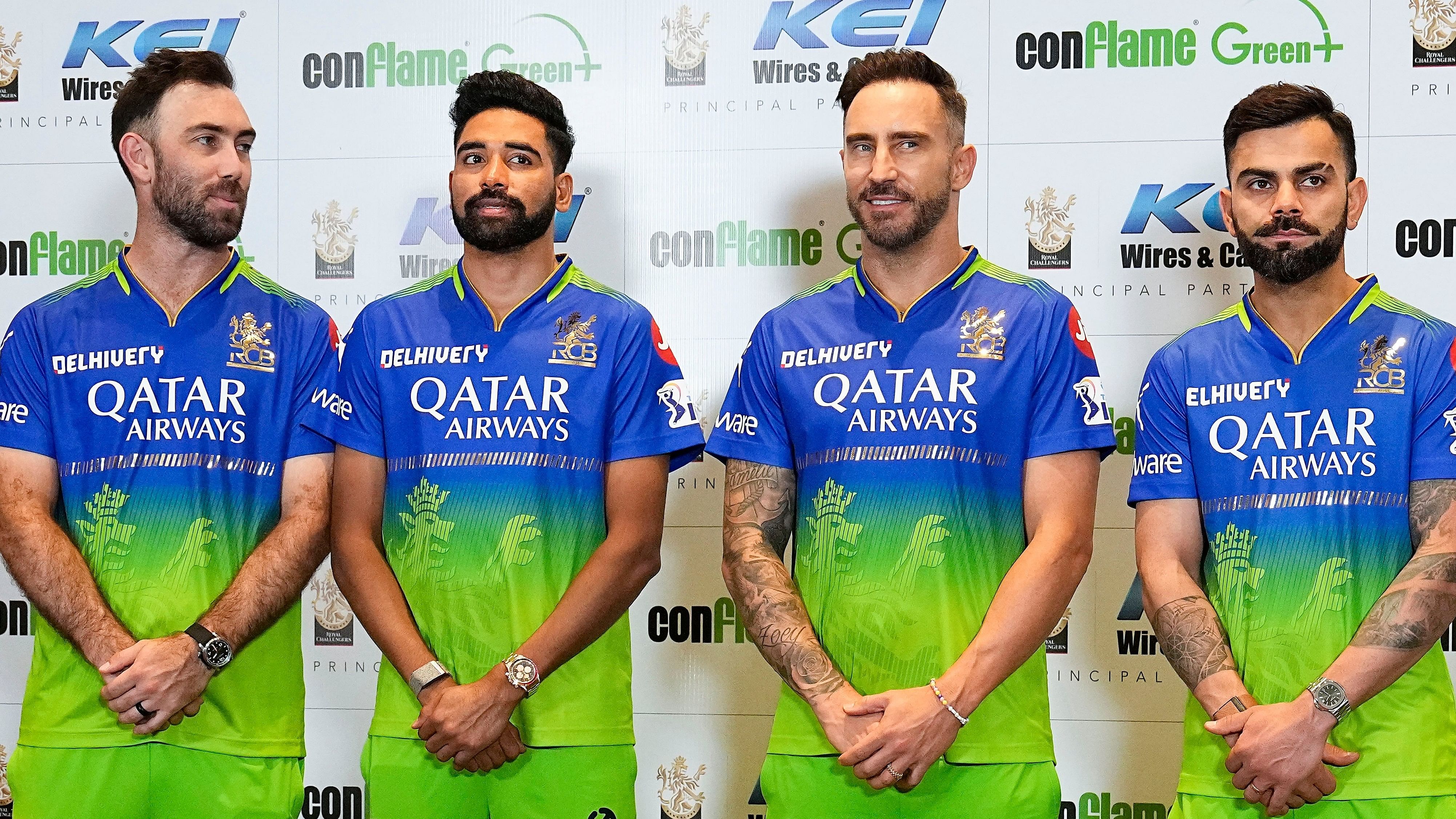 Royal Challengers Bengaluru captain Faf du Plessis (second from right) with teammates Virat Kohli (right), Mohammed Siraj (second from left) and Glenn Maxwell during the launch of team’s green jersey in Chennai on Wednesday. PTI