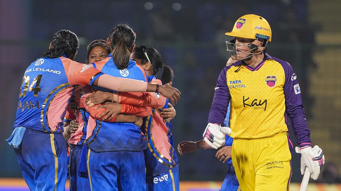 <div class="paragraphs"><p>Mumbai Indians' players celebrate the wicket of UP Warriorz's Grace Harris during the Women's Premier League (WPL) 2024 cricket match between Mumbai Indians and UP Warriorz, at Arun Jaitley Stadium in New Delhi</p></div>