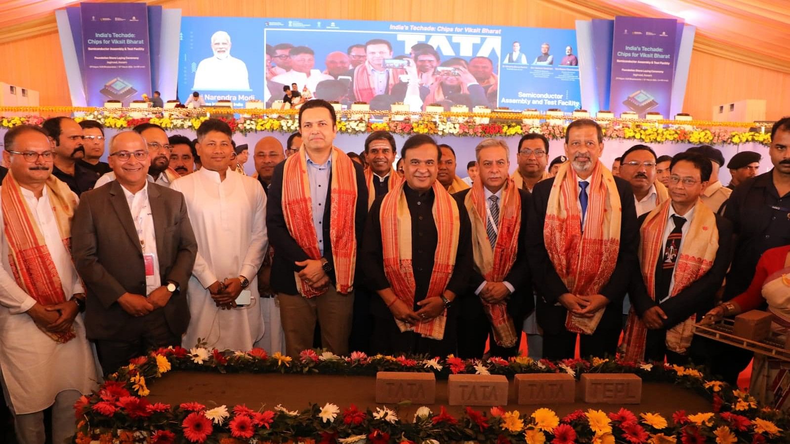 <div class="paragraphs"><p>Assam Chief Minister Himanta Biswa Sarma (C) and other executives and officials during the foundation stone laying ceremony for the Tata semiconductor plant.</p></div>