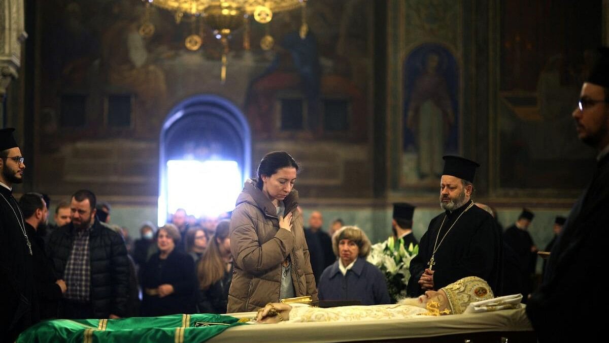 <div class="paragraphs"><p>A woman pays her respects during a memorial service for the late Bulgarian patriarch Neophyte at St Alexander Nevsky Cathedral, in Sofia, Bulgaria on March 15, 2024.</p></div>