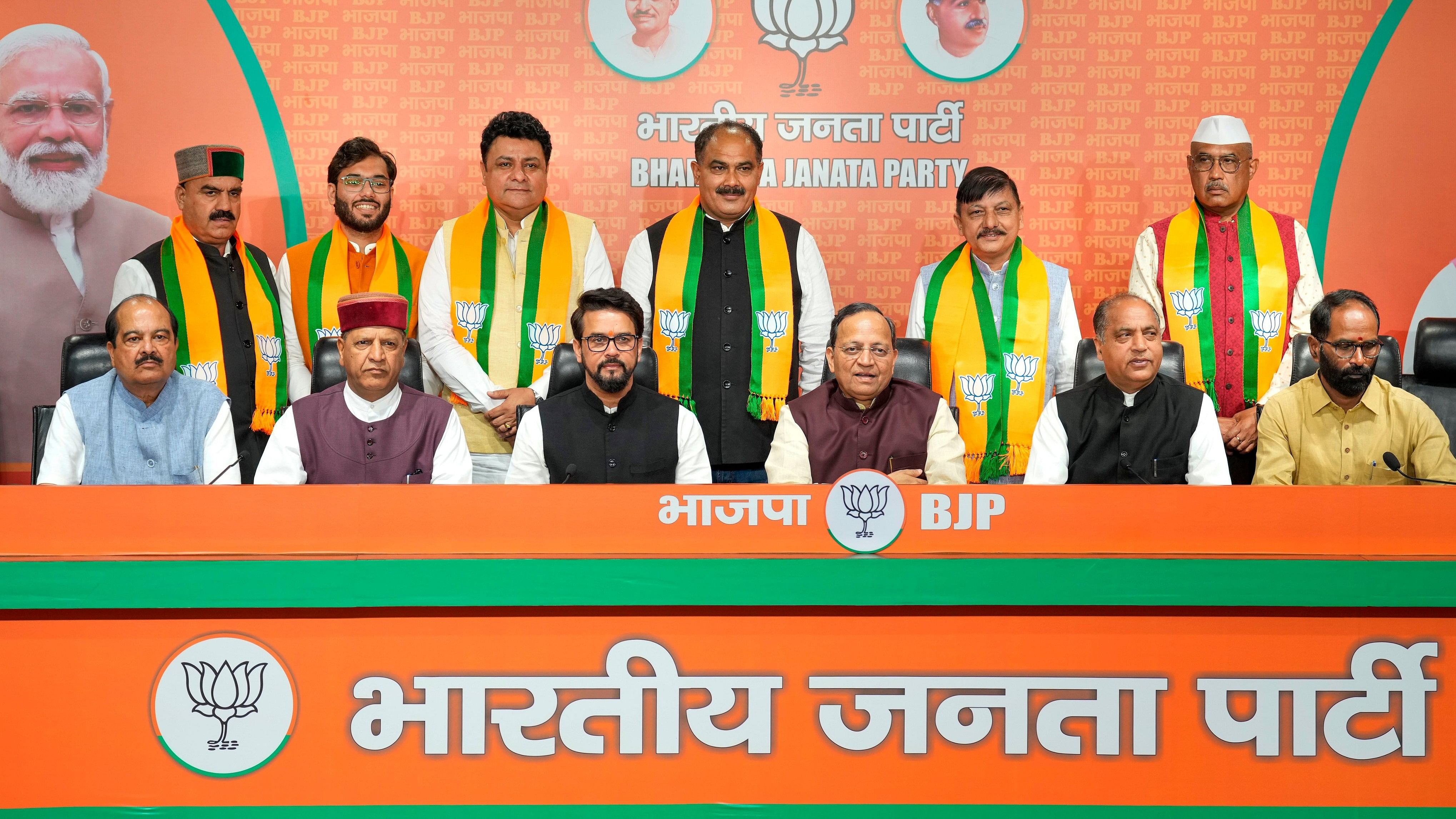 <div class="paragraphs"><p>Union Minister Anurag Thakur, former Himachal Pradesh CM and BJP leader Jai Ram Thakur and party leader Arun Singh with former Congress  party MLAs Sudhir Sharma, Rajender Rana, Ravi Thakur, Indradutt Lakhanpal, Devendra Bhutto and Chaitanya Sharma who joined BJP, in New Delhi, Saturday, March 23, 2024.   </p></div>