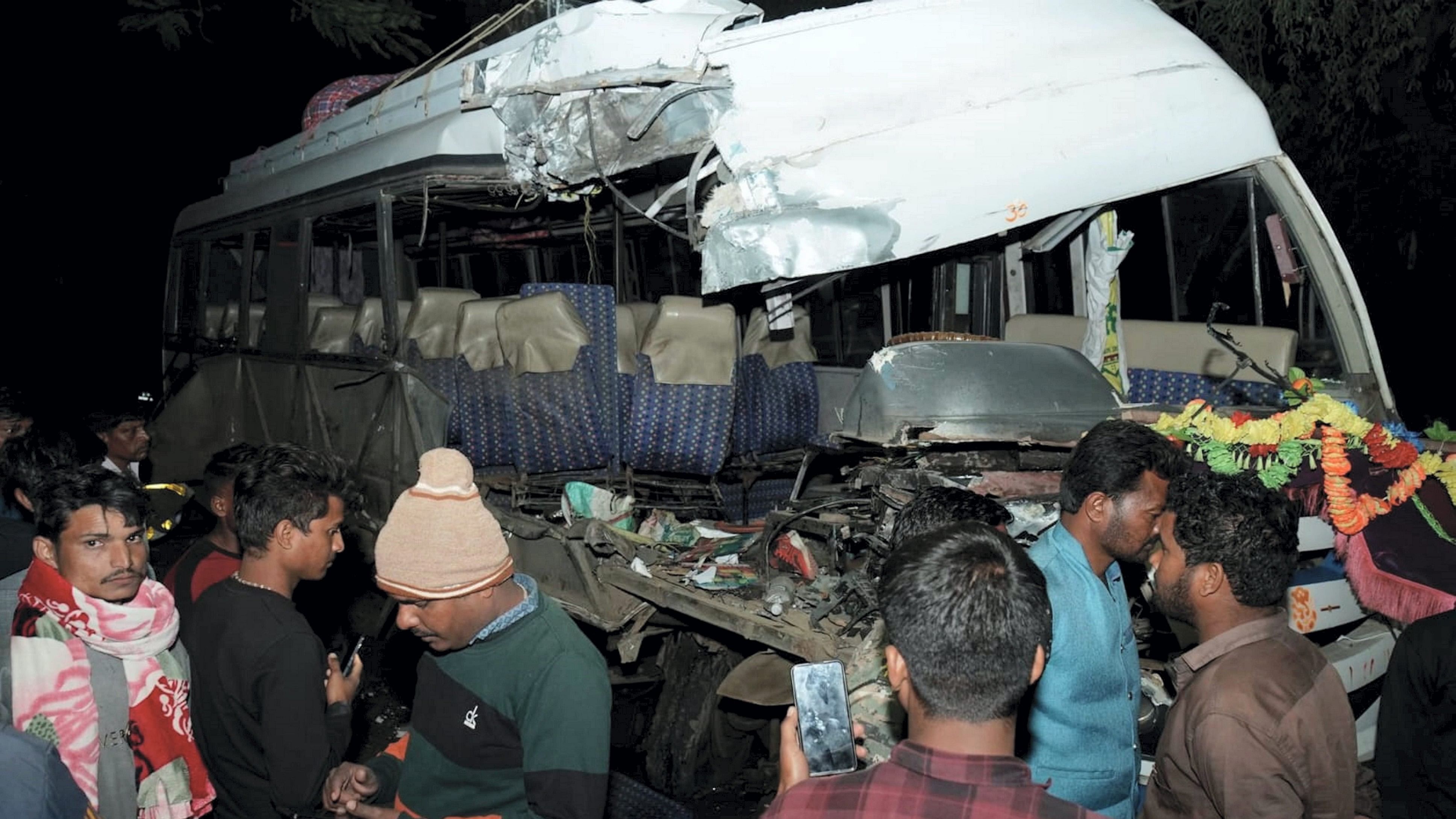 <div class="paragraphs"><p>Lohardaga: Locals at the site after a collision of a bus with a truck, in Lohardaga district, Jharkhand, Friday night, March 22, 2024. At least 3 people were killed and eight others were injured in the accident, according to police.</p></div>