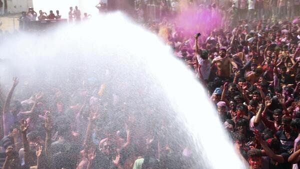 <div class="paragraphs"><p> People play with colours and dance under a water spray on the occasion of Holi, in Pushkar, Monday, March 25, 2024.</p></div>