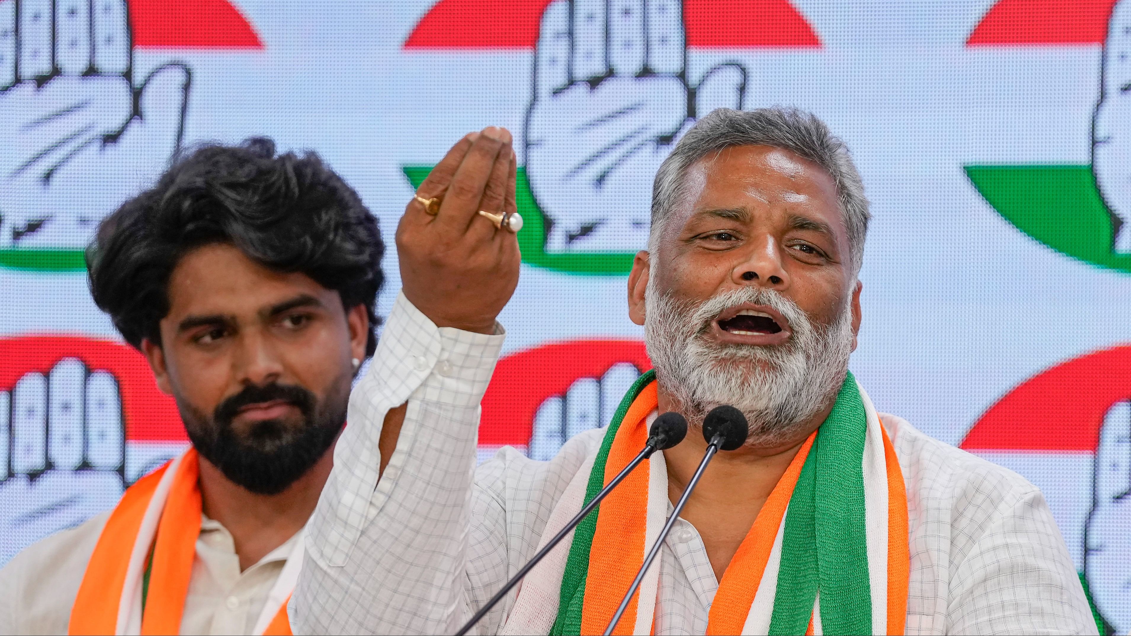 <div class="paragraphs"><p>File photo of&nbsp;Pappu Yadav with his son Sarthak Ranjan.</p></div>