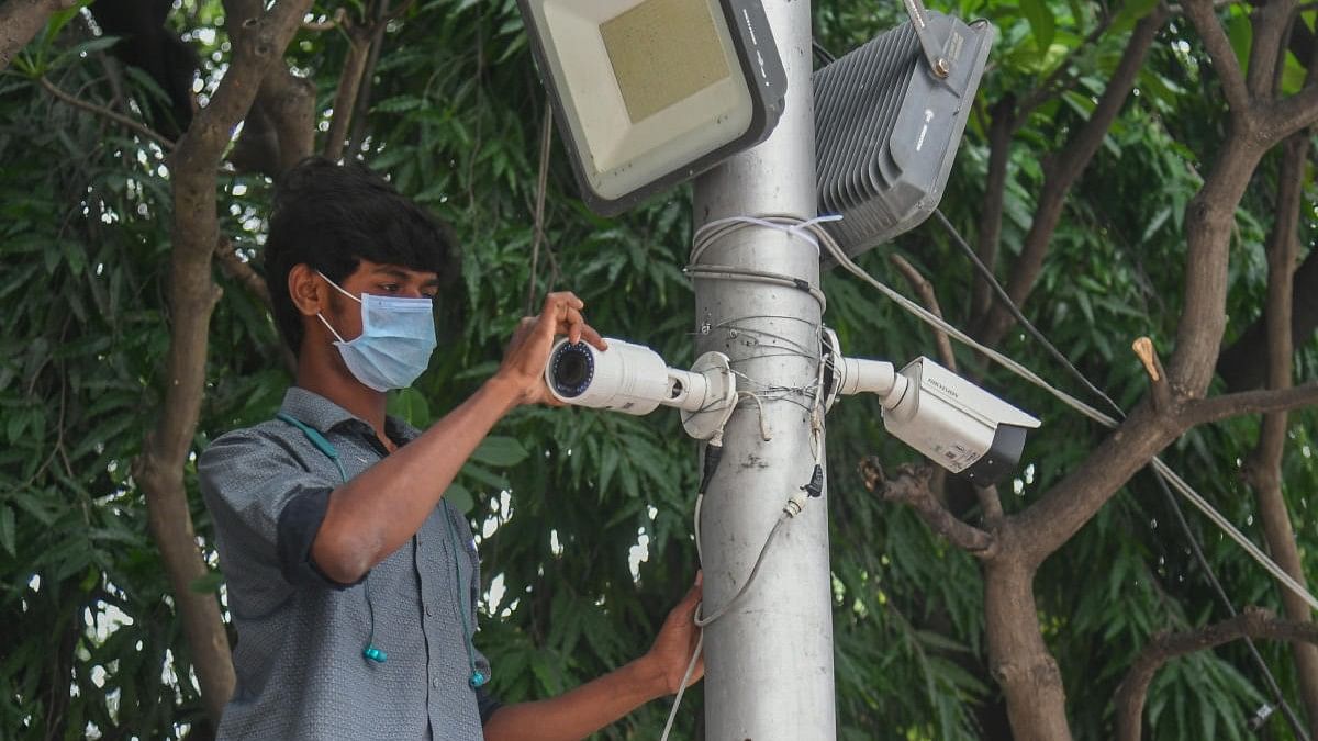 <div class="paragraphs"><p>Representative image showing a worker fixing a CCTV camera</p></div>